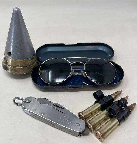 New items arrived today for the website. a nice pair of RAF 22G1398 Type G Sun Glasses, RBS Stainless Steel Pocket Knife, 3 x 300s 1941 dated cartridges in disintegrating link, 199 Fuze for the 3.7 Anti Aircraft Gun