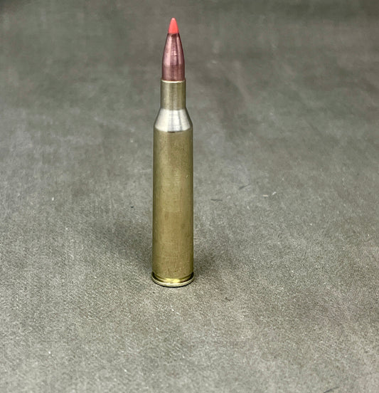 Bullet casing on a gray textured background