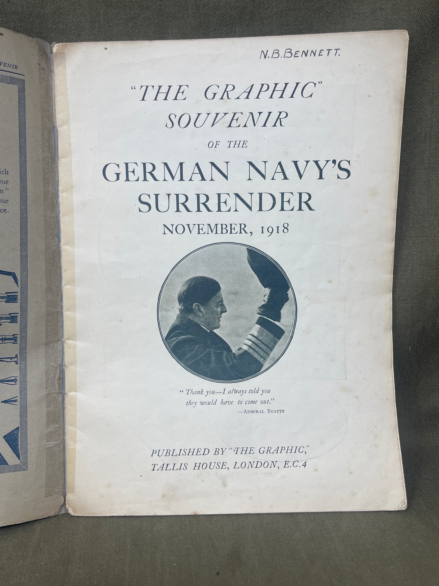 Booklet titled 'The Graphic Souvenir of the German Navy's Surrender' from November 1918 on a dark background