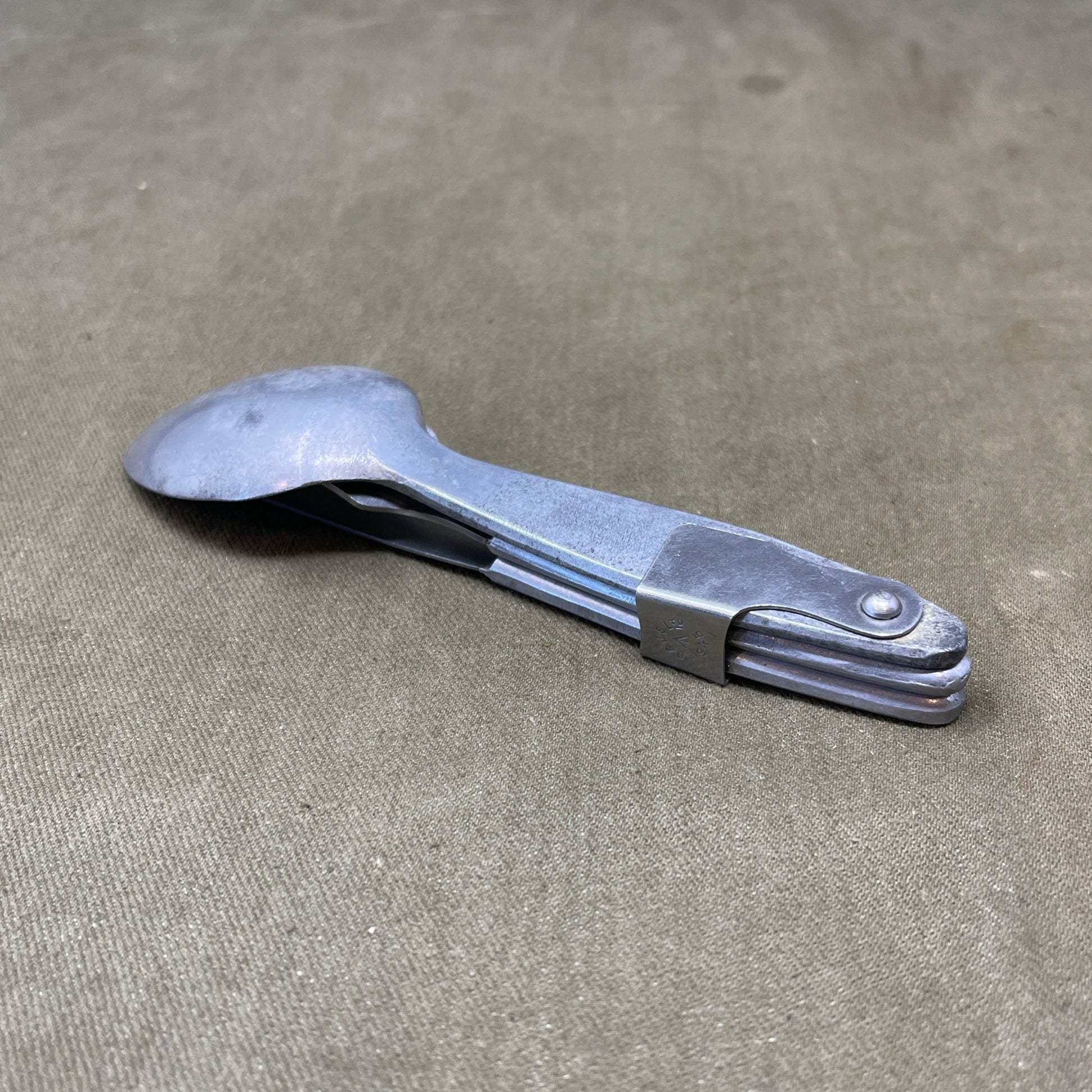 Knife, fork, and Spoon set dated 1945 Compactium