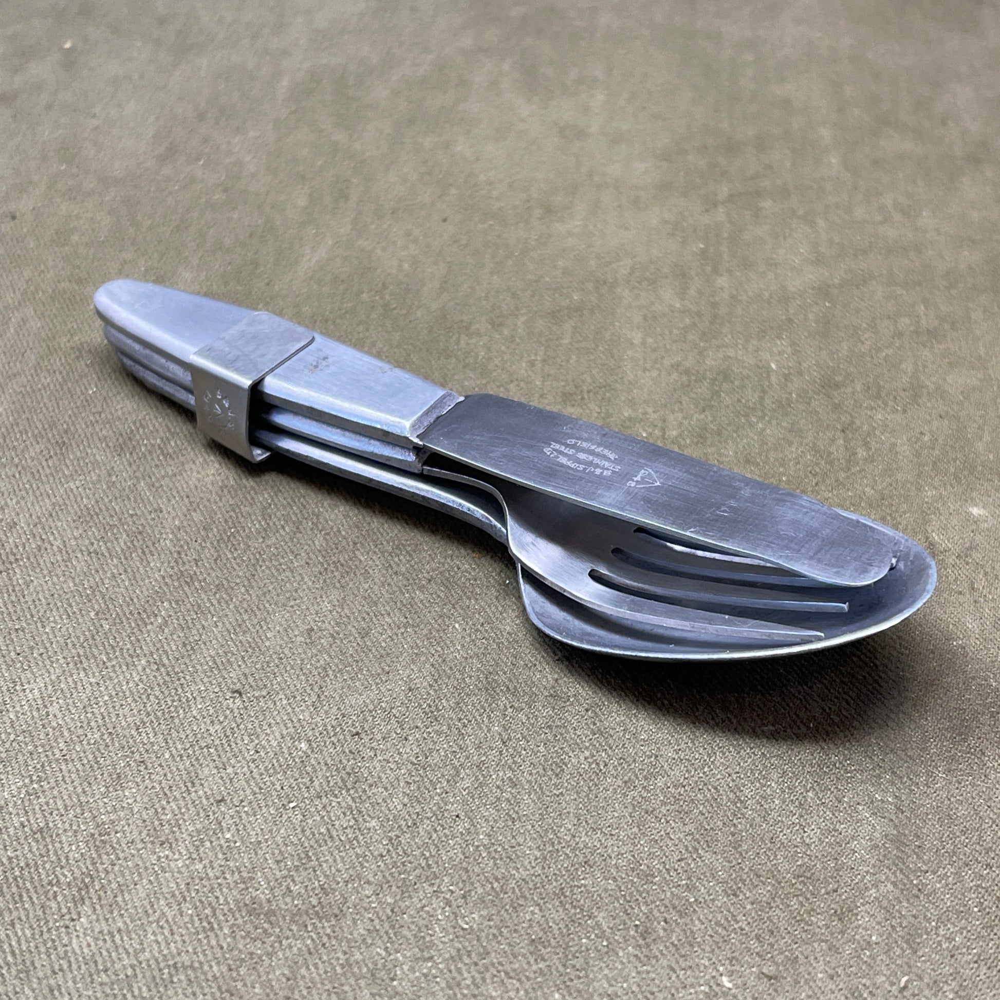 Knife, fork, and Spoon set dated 1945 Compactium