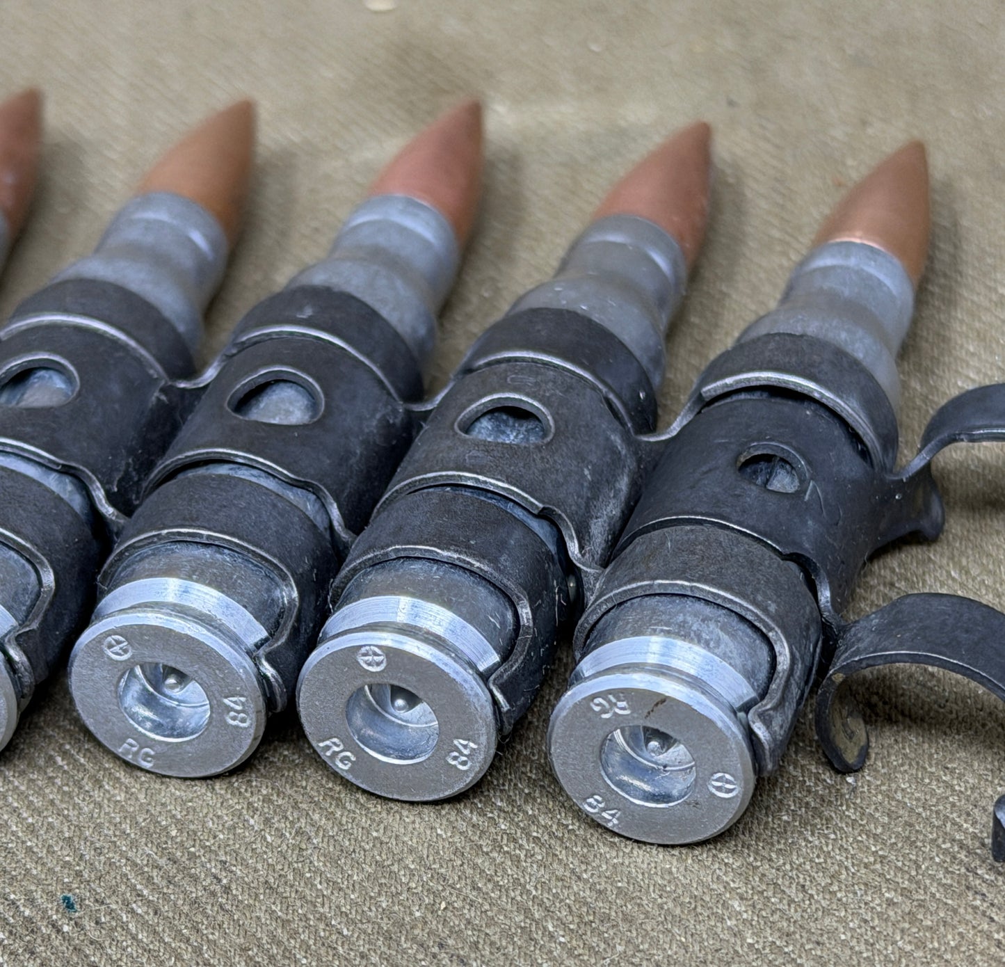 10 x 7.62mm British Military Drill Rounds in Original GPMG Link Belt – Inert Display Set