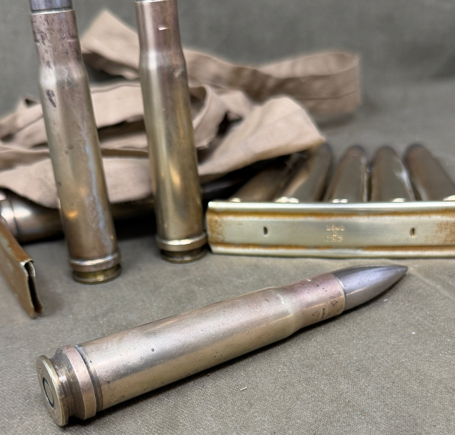 WW2 .55 Boys Anti-Tank Rounds on Clips in Original 1942 Cloth Carry Case – K42 Headstamps (10 Inert Rounds)