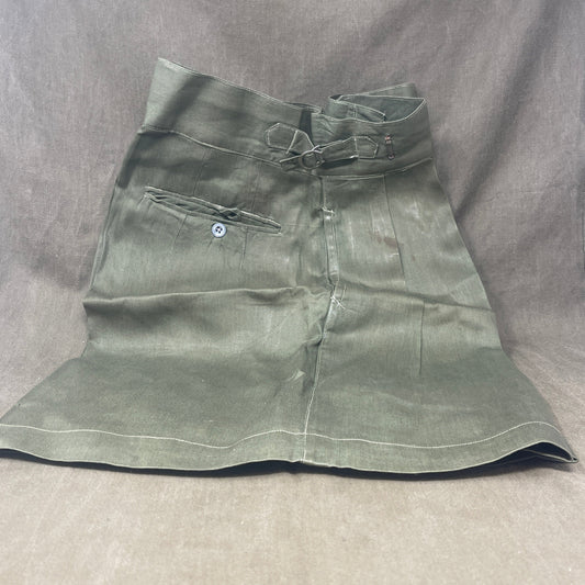 Original 1950s British Army Jungle Green shorts, locally made, Size 3 (30"-31" waist). Excellent condition with classic military design—ideal for collectors or re-enactors.
