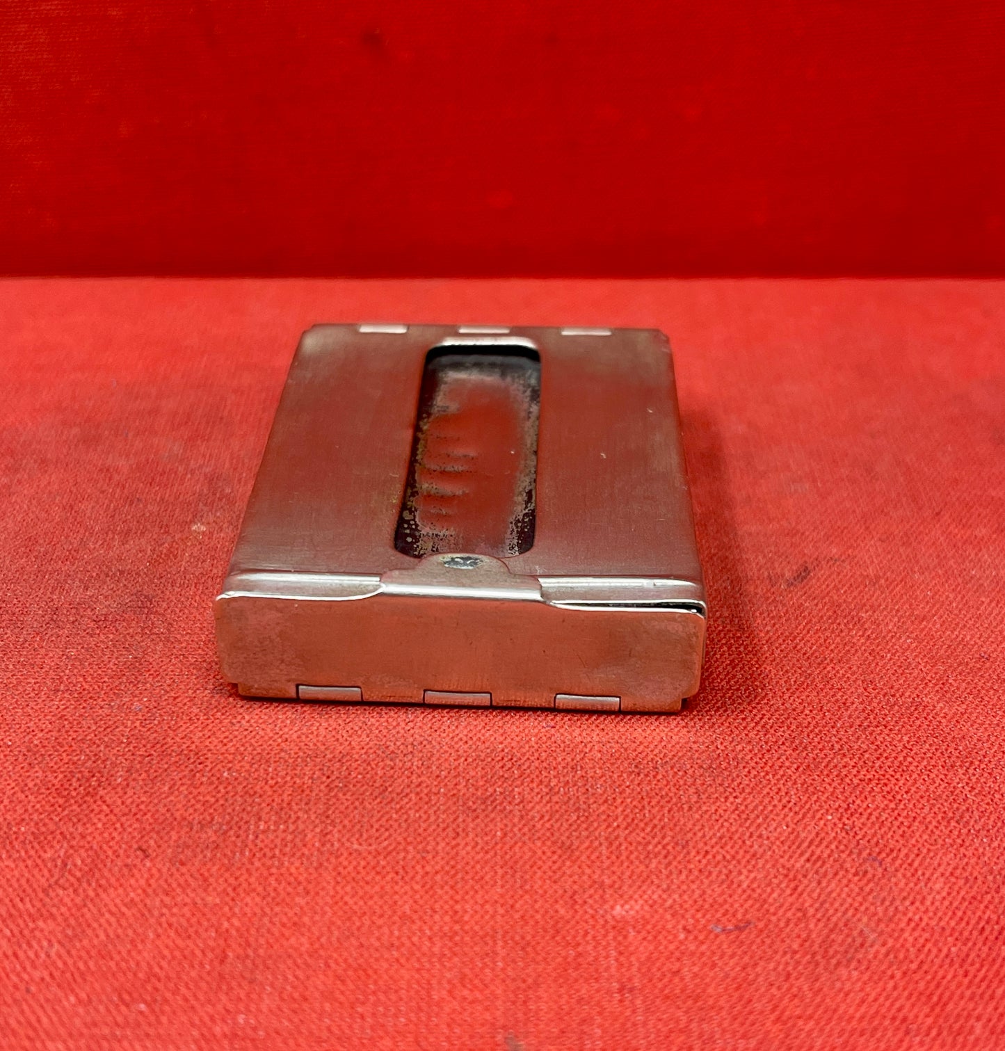 Add a touch of vintage charm to your collection with this original British brass hinged match holder, dating to the 1920s. Crafted from solid brass with a warm aged patina, it features a hinged lid and internal compartment designed to keep matches dry and ready for use. Compact and practical, it would have been a common pocket or travel item in the early 20th century. Ideal for collectors of antique smoking accessories, vintage EDC items, or brassware. A beautiful and functional relic from post-WWI Britain,