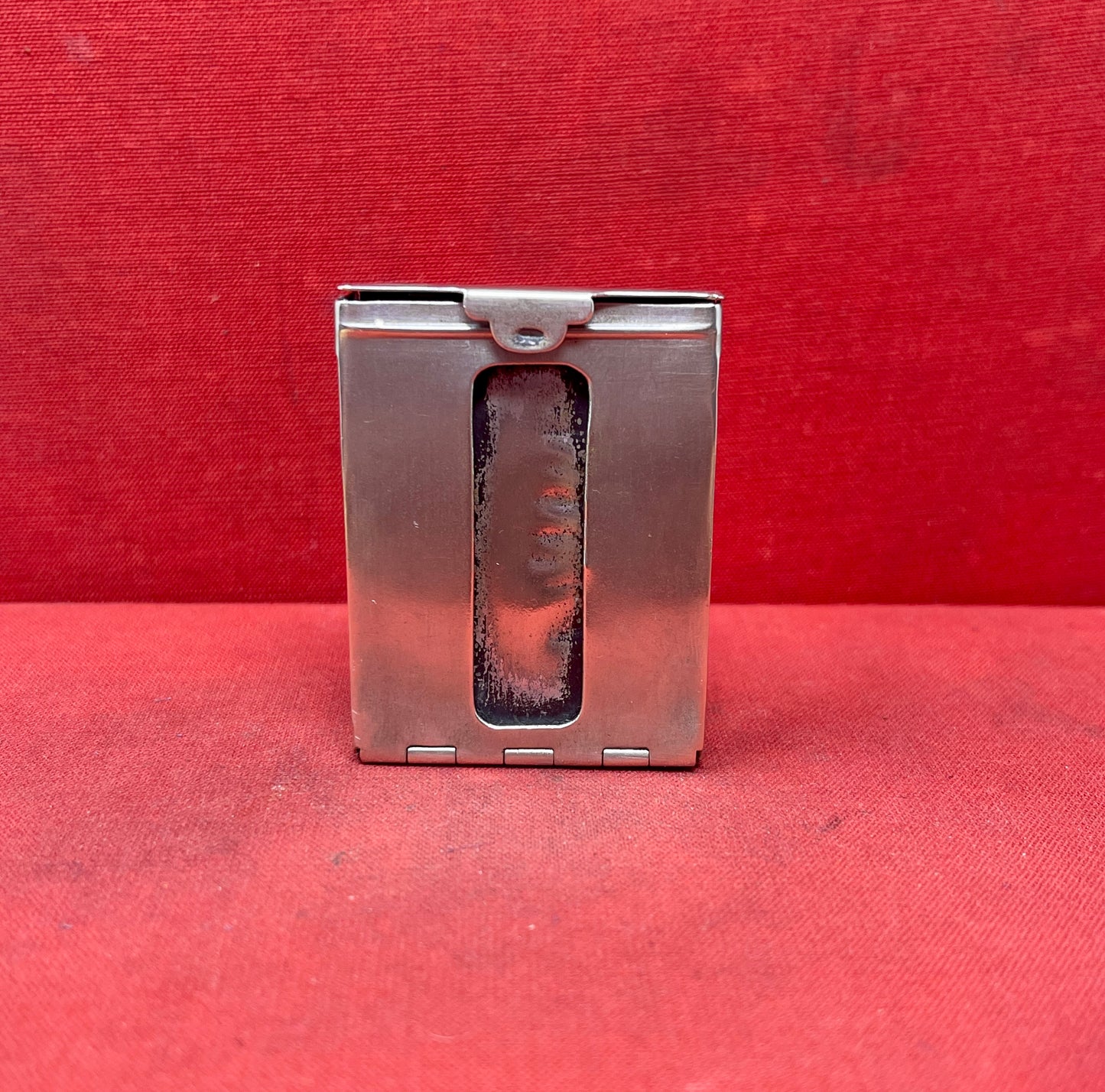 Add a touch of vintage charm to your collection with this original British brass hinged match holder, dating to the 1920s. Crafted from solid brass with a warm aged patina, it features a hinged lid and internal compartment designed to keep matches dry and ready for use. Compact and practical, it would have been a common pocket or travel item in the early 20th century. Ideal for collectors of antique smoking accessories, vintage EDC items, or brassware. A beautiful and functional relic from post-WWI Britain,