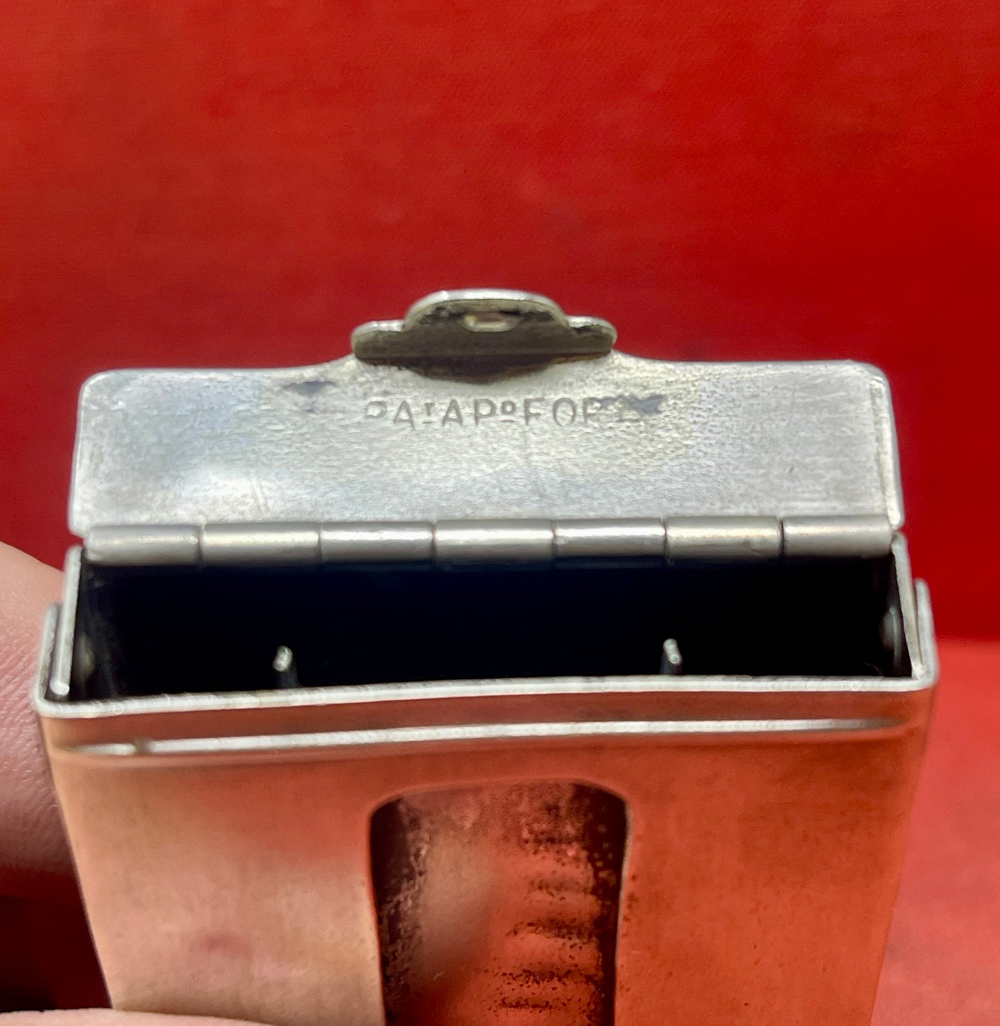 Add a touch of vintage charm to your collection with this original British brass hinged match holder, dating to the 1920s. Crafted from solid brass with a warm aged patina, it features a hinged lid and internal compartment designed to keep matches dry and ready for use. Compact and practical, it would have been a common pocket or travel item in the early 20th century. Ideal for collectors of antique smoking accessories, vintage EDC items, or brassware. A beautiful and functional relic from post-WWI Britain,