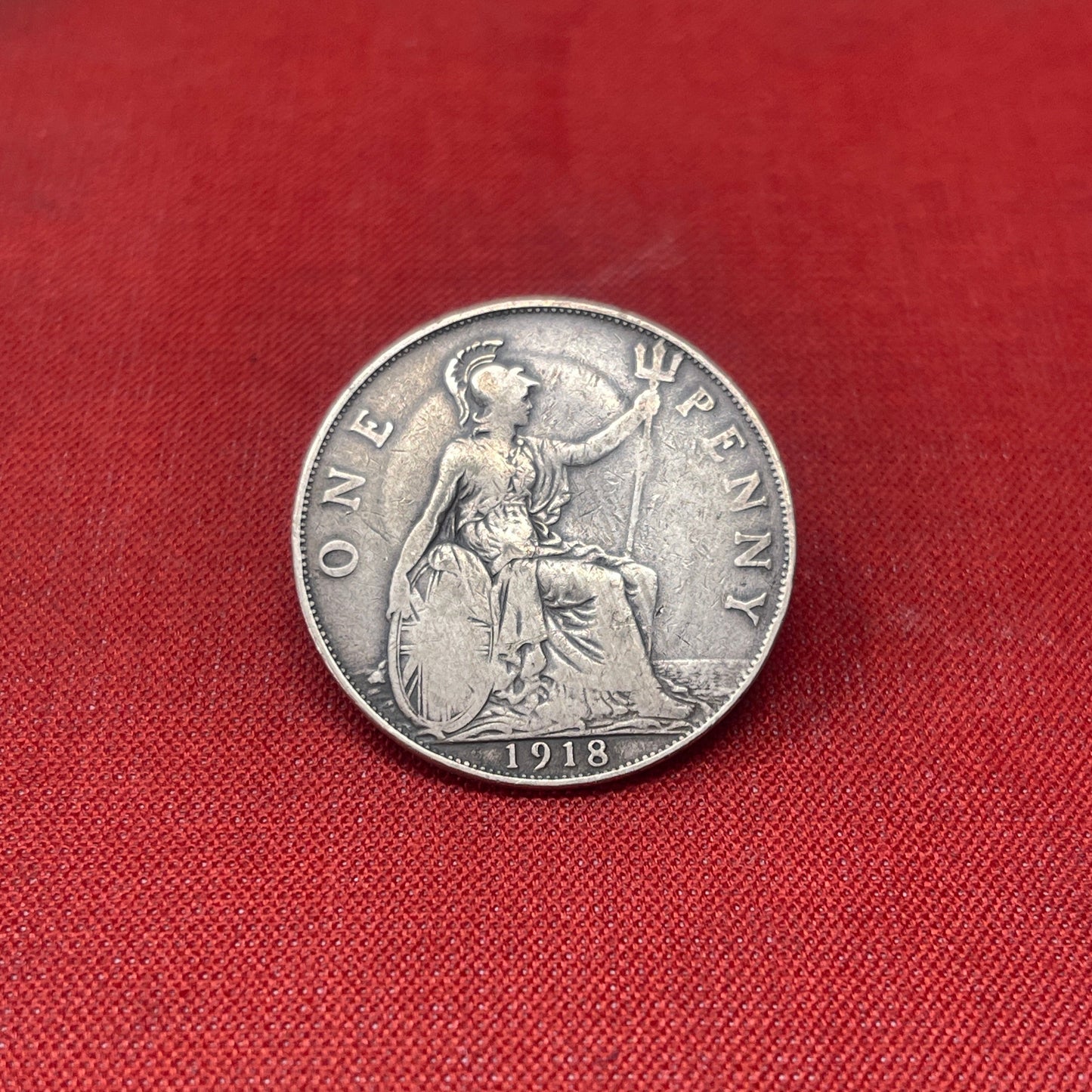 Explore the history and collectability of the King George V One Penny dated 1936. Perfect for numismatists and history enthusiasts seeking an authentic piece of British coinage.