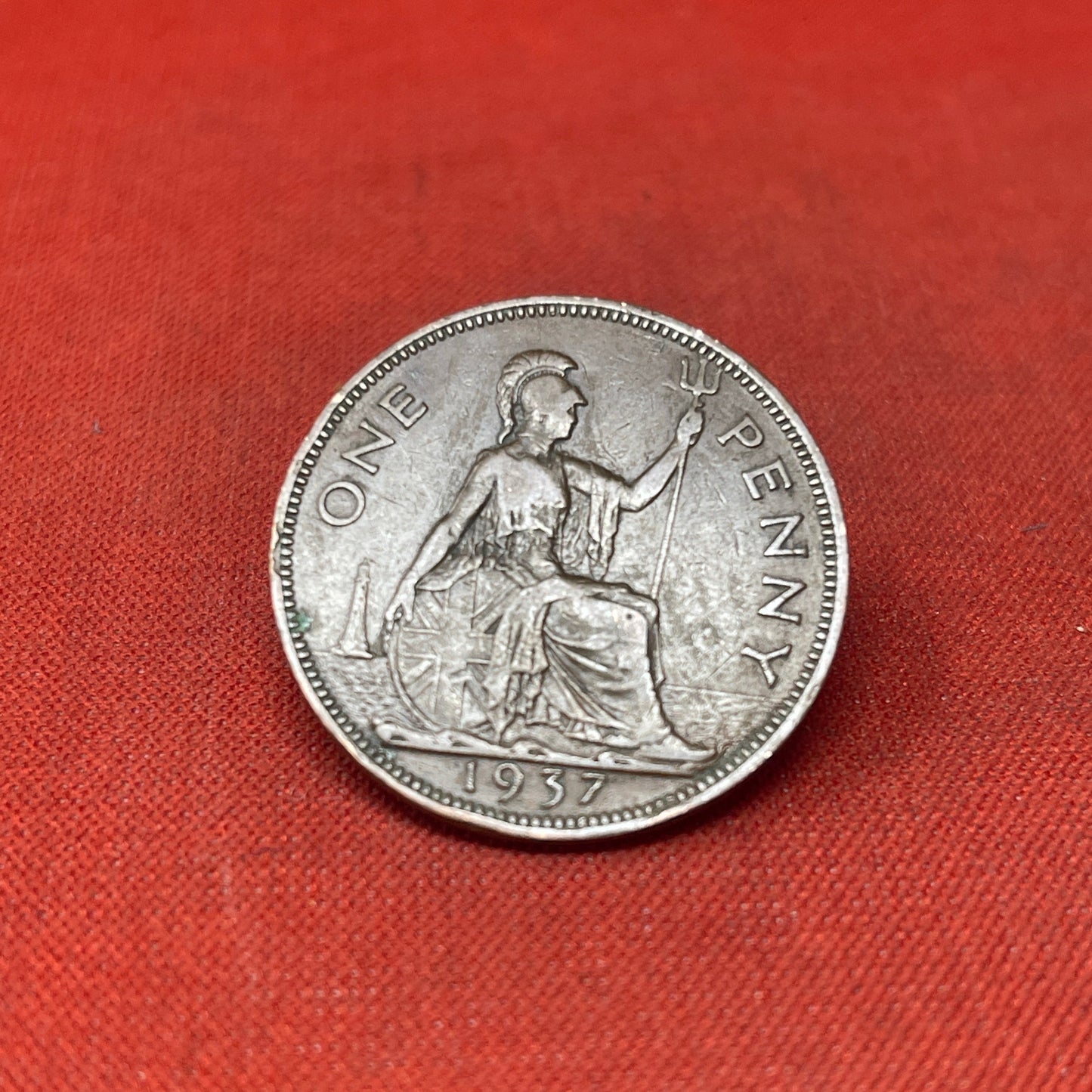 Explore the historical significance of the King George VI One Penny coin, minted from 1937 to 1952. Ideal for collectors and history enthusiasts seeking an authentic piece of British numismatic heritage
