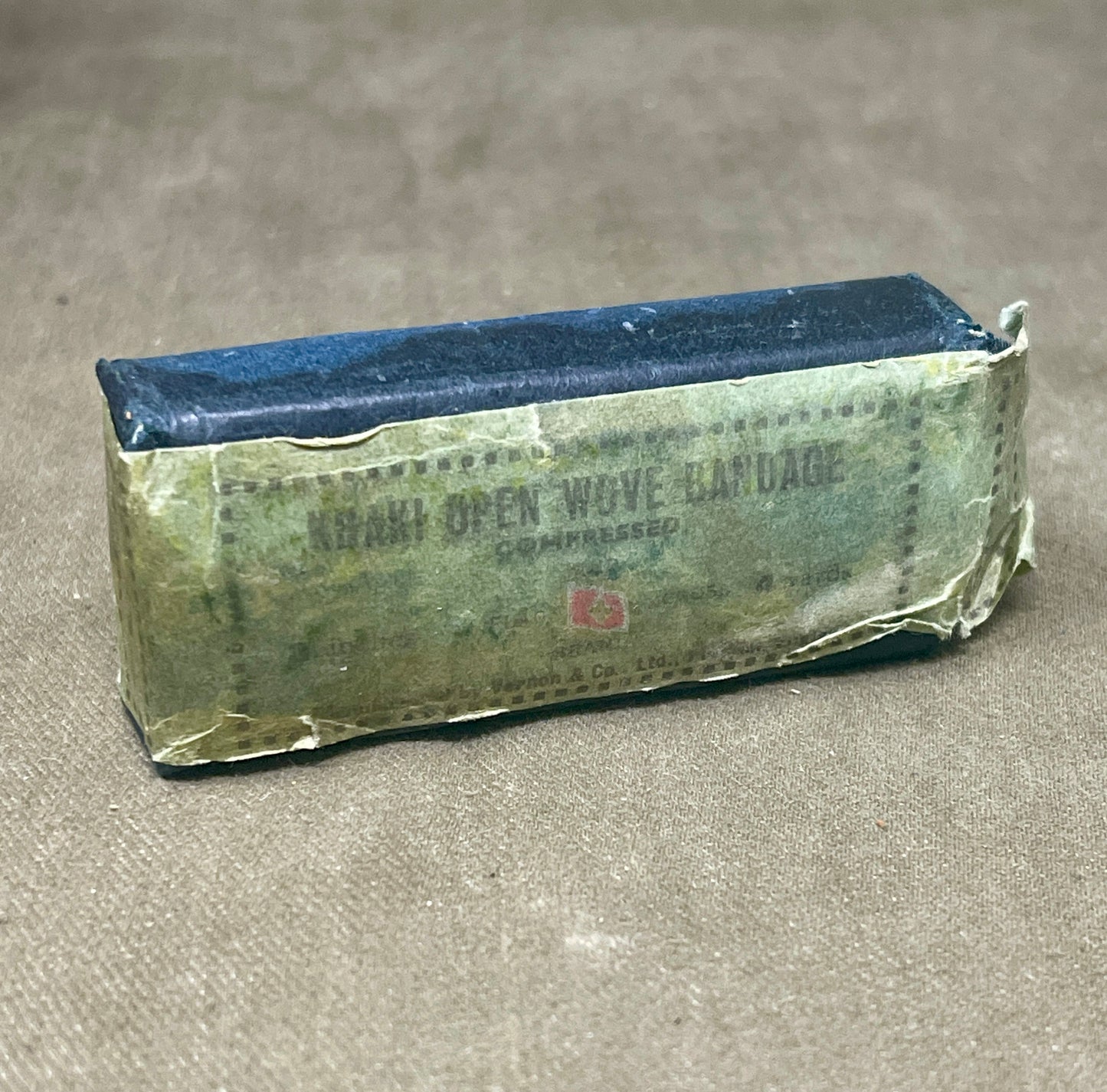 Selection of WW2 PeriodKhaki Open Wove Bandage Compressed Dressings