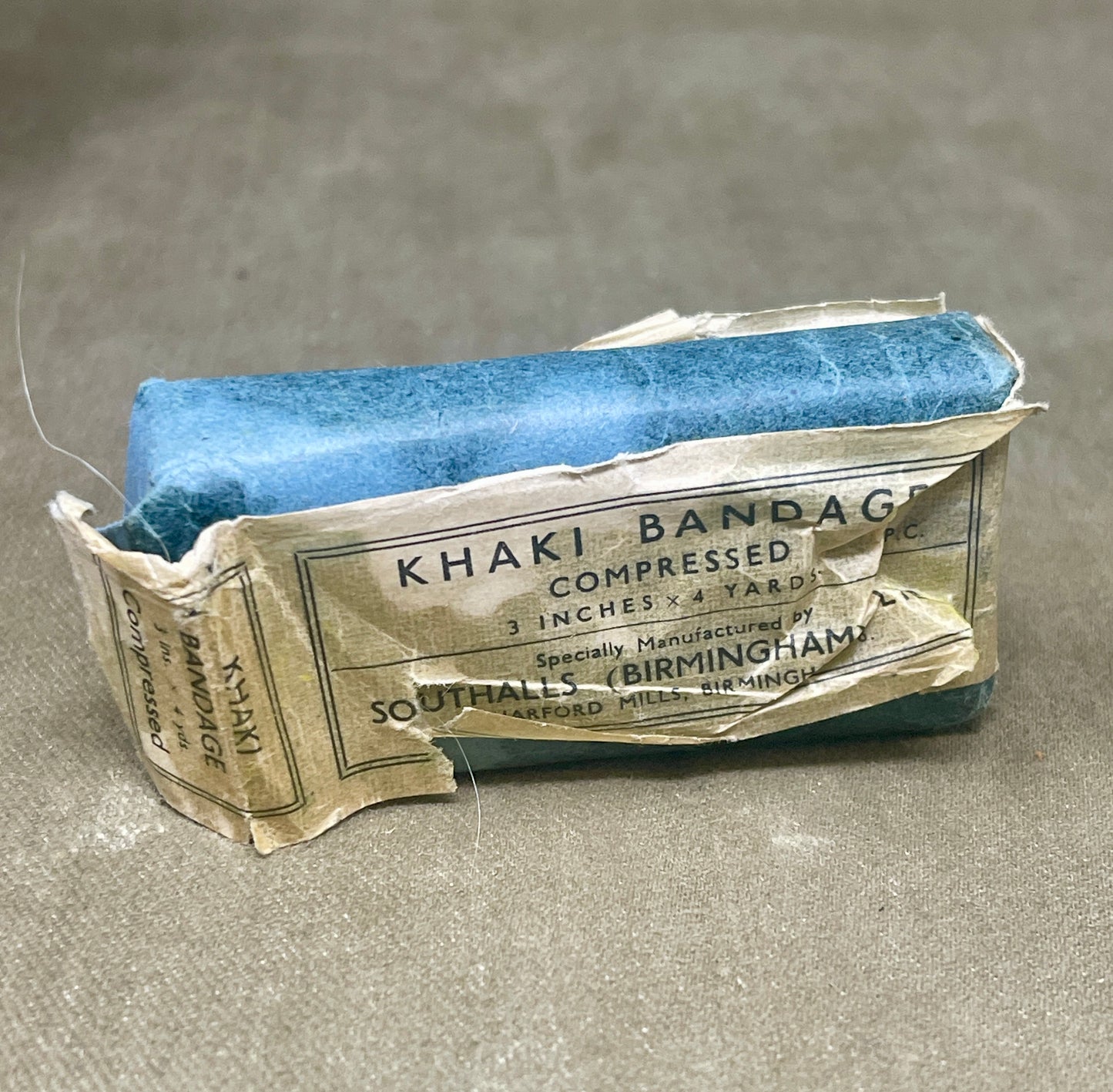 Selection of WW2 PeriodKhaki Open Wove Bandage Compressed Dressings