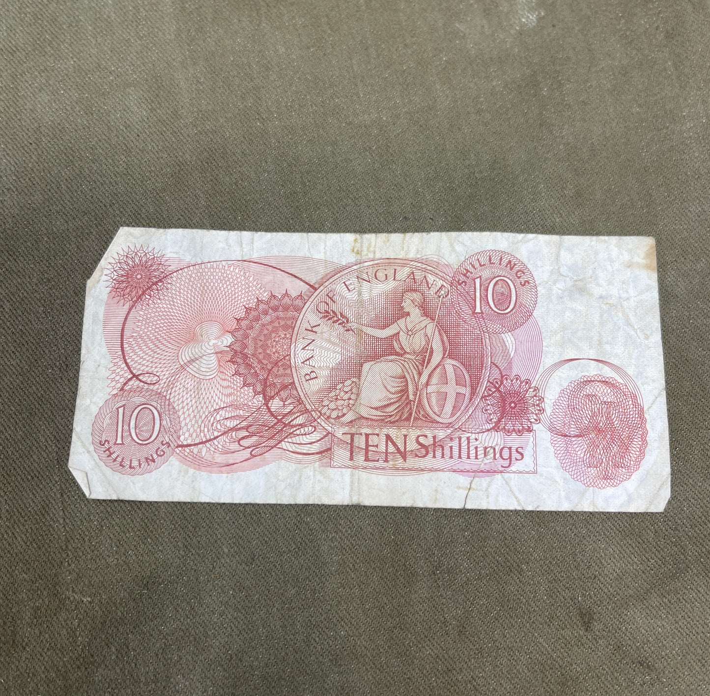 This selection features original Bank of England 10 Shilling notes signed by J.S. Fforde, catalogued as Dugg B309 in the English banknote series. Issued between 1967 and 1970, these notes are iconic pieces of British pre-decimal currency, bearing the classic Britannia design and red-brown colouring. Each note in this lot is in circulated (used) condition, showing varying degrees of wear, creasing, and edge softening typical of handling and circulation. Despite this, the notes remain clear and legible, with