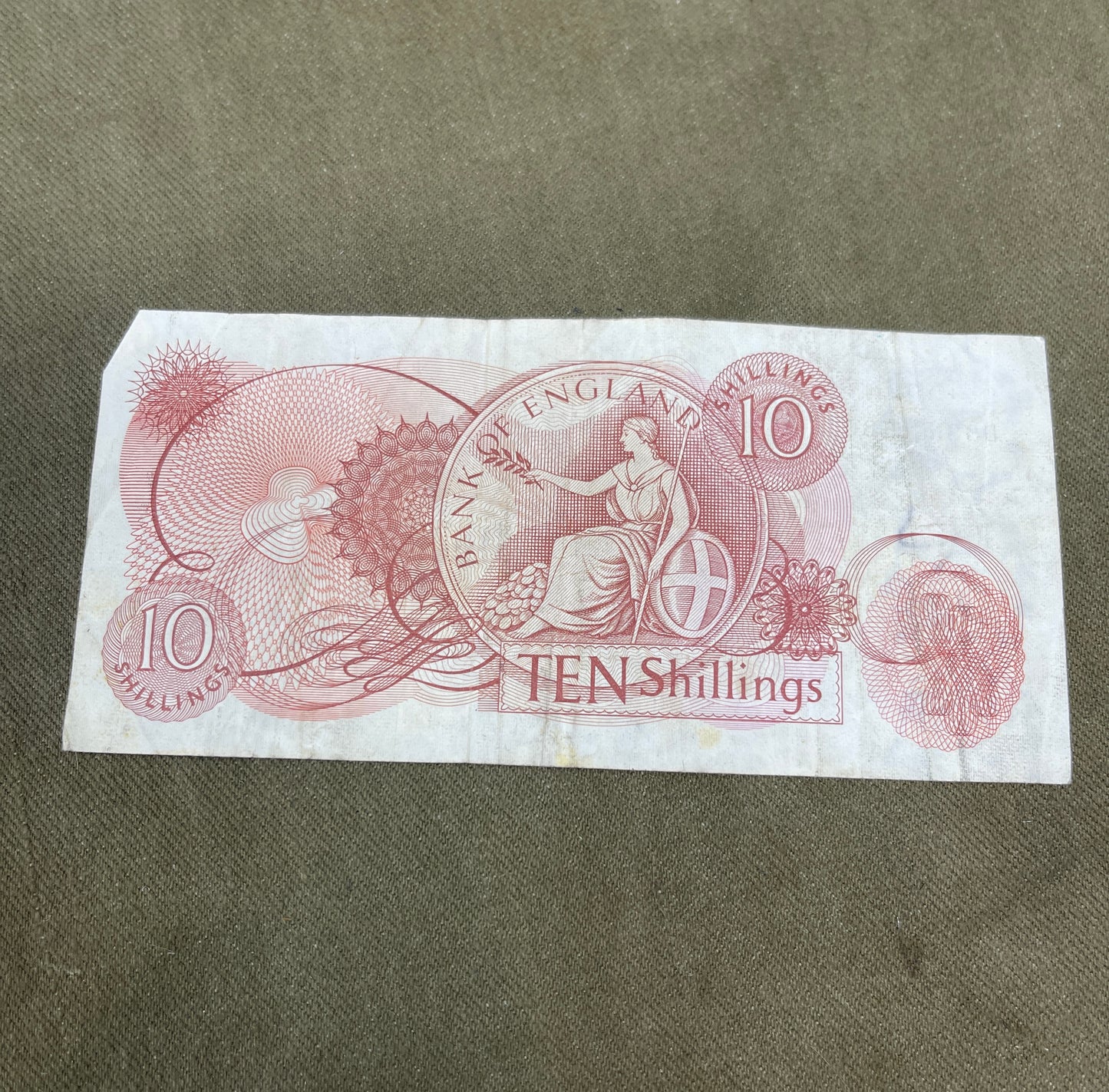 This selection features original Bank of England 10 Shilling notes signed by J.S. Fforde, catalogued as Dugg B309 in the English banknote series. Issued between 1967 and 1970, these notes are iconic pieces of British pre-decimal currency, bearing the classic Britannia design and red-brown colouring. Each note in this lot is in circulated (used) condition, showing varying degrees of wear, creasing, and edge softening typical of handling and circulation. Despite this, the notes remain clear and legible, with