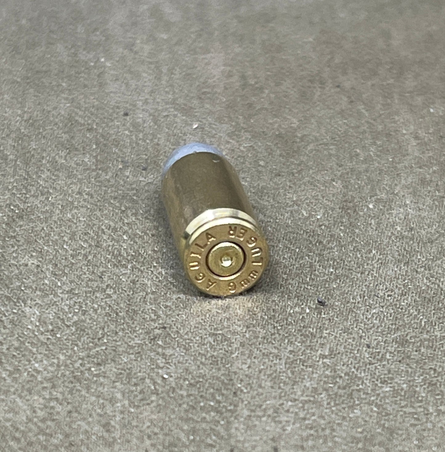 Bullet casing on a concrete surface