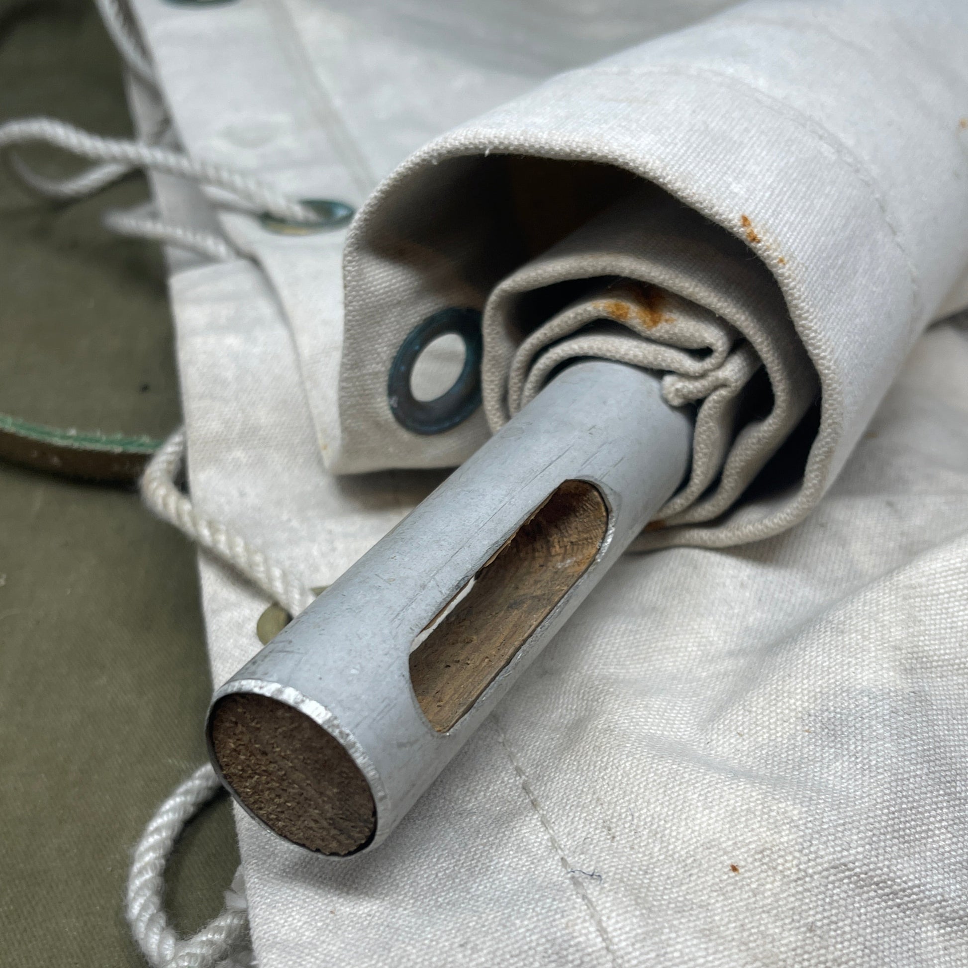 Close-up of a metal grommet in a piece of fabric