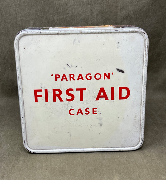Vintage 'Paragon' first aid case with red text on a gray background