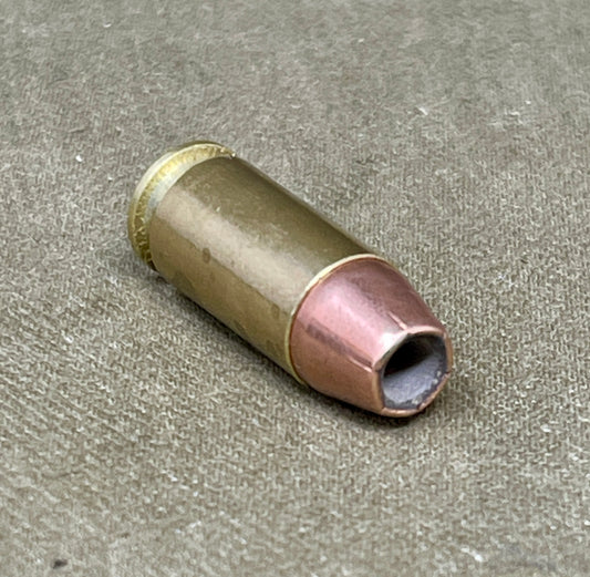 Bullet casing on a textured surface