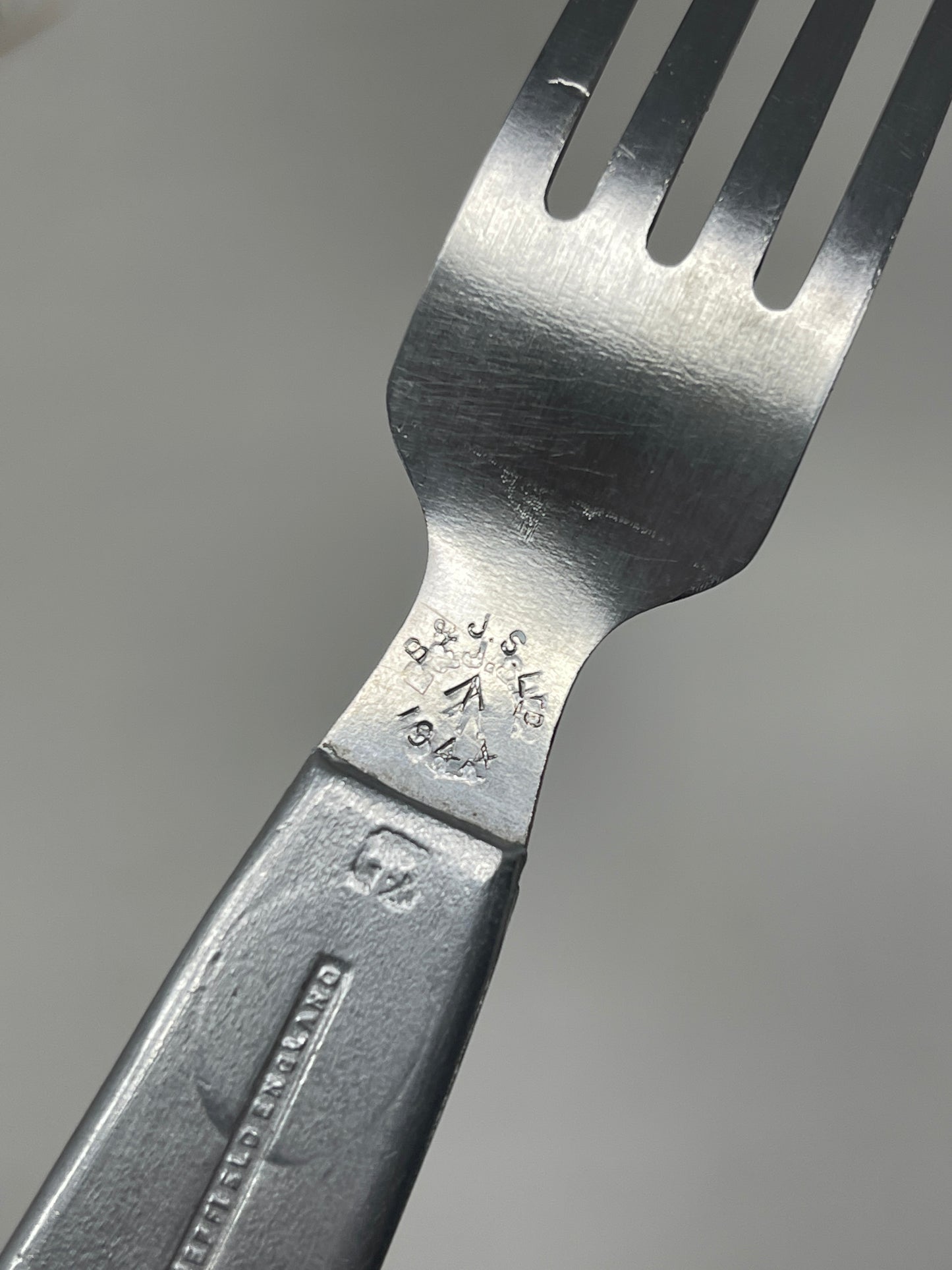 Knife, fork, and spoon set dated 1944