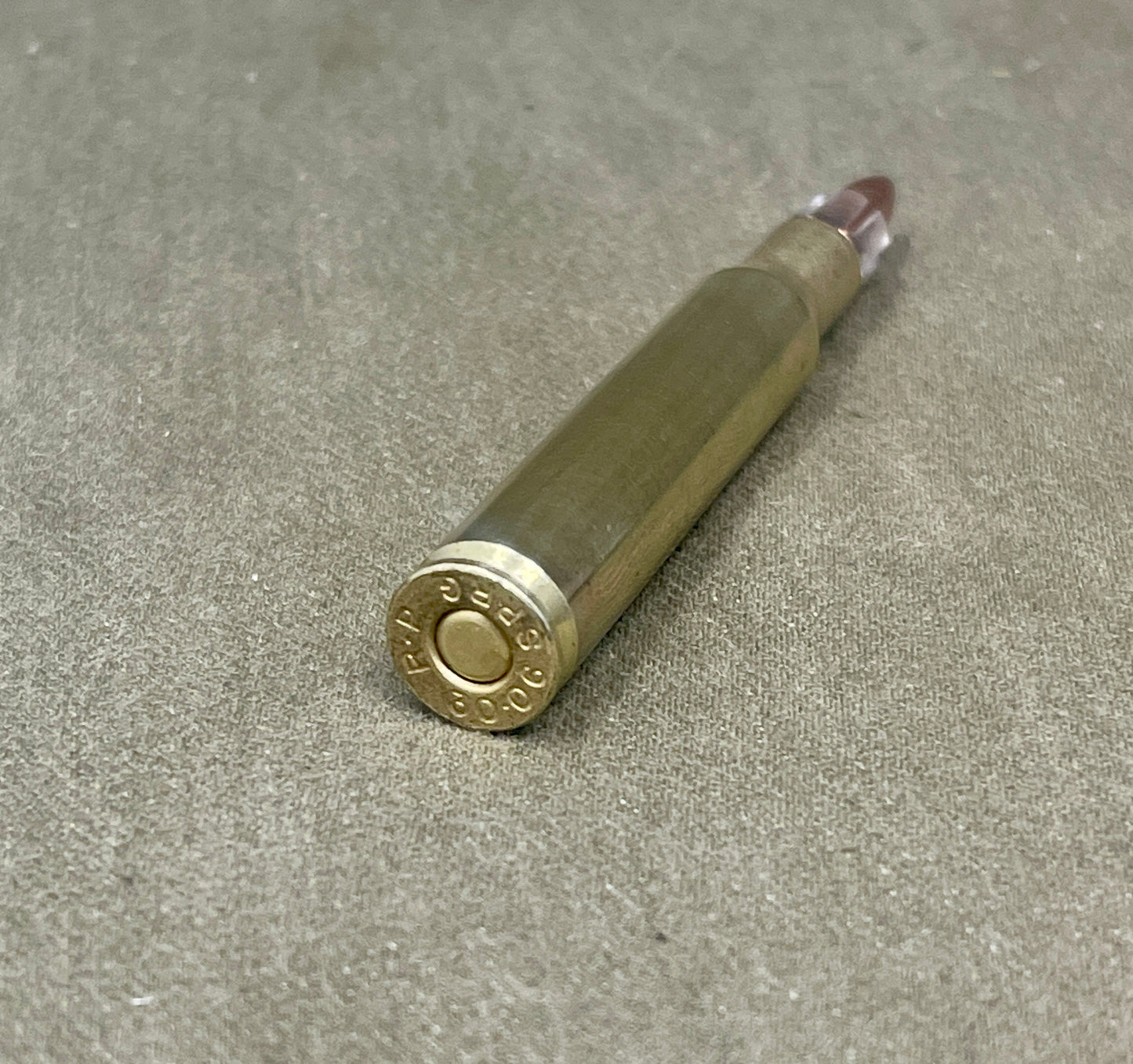 Bullet casing on a textured surface