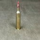 Bullet casing on a gray textured background