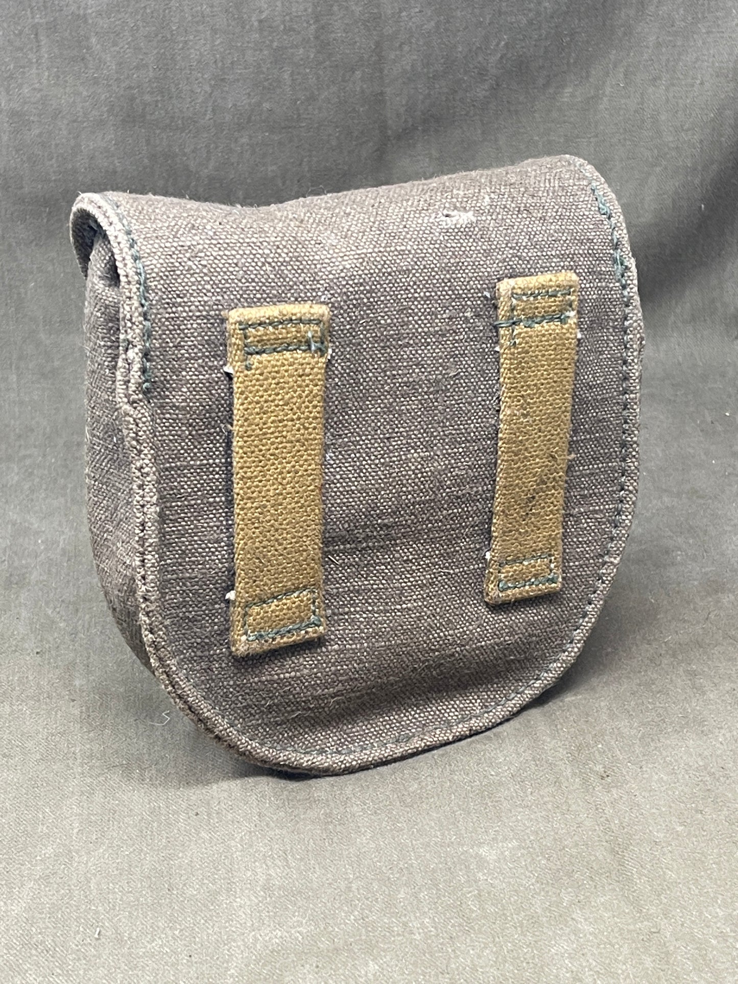 Original Soviet PPSH-41 magazine, professionally fitted with twenty INERT 7.62×25 Tokarev cartridges — an excellent display piece for collectors, museums, and historical reenactors. This authentic magazine displays honest service wear and patina while retaining its original spring and follower, matching period-correct dimensions and finish. Each cartridge is certified inert: they contain no propellant, explosive agents, or hazardous materials, and all primers have been either fired or permanently rendered i