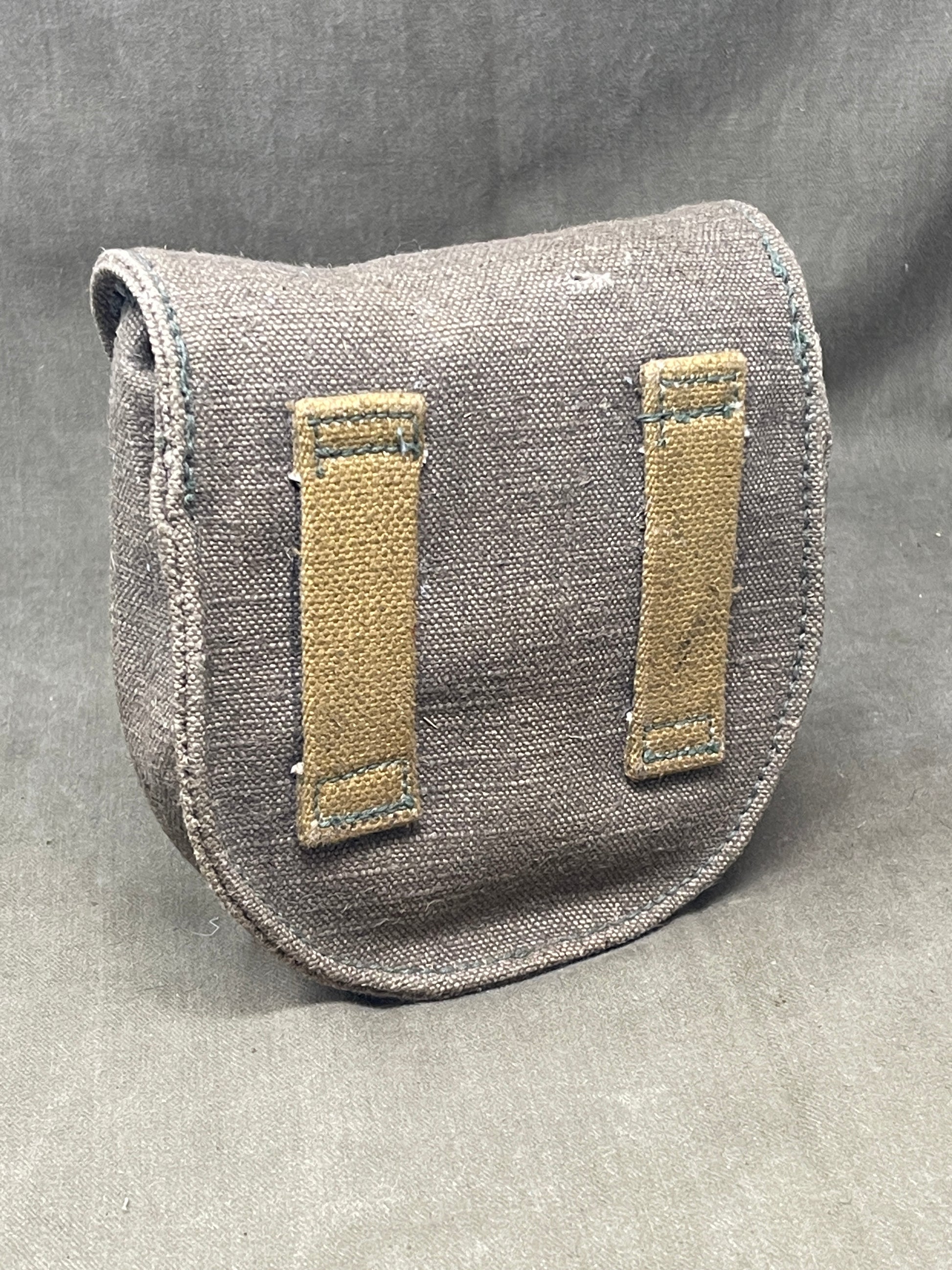 Original Soviet PPSH-41 magazine, professionally fitted with twenty INERT 7.62×25 Tokarev cartridges — an excellent display piece for collectors, museums, and historical reenactors. This authentic magazine displays honest service wear and patina while retaining its original spring and follower, matching period-correct dimensions and finish. Each cartridge is certified inert: they contain no propellant, explosive agents, or hazardous materials, and all primers have been either fired or permanently rendered i