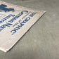 Vintage newspaper or book with text on a textured surface