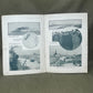 Open book with black and white photographs on a gray background