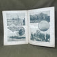 Open book with black and white photographs on a gray surface