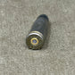 Bullet casing on a textured surface