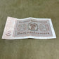 Vintage German banknote from Deutsche Rentenbank on a textured surface