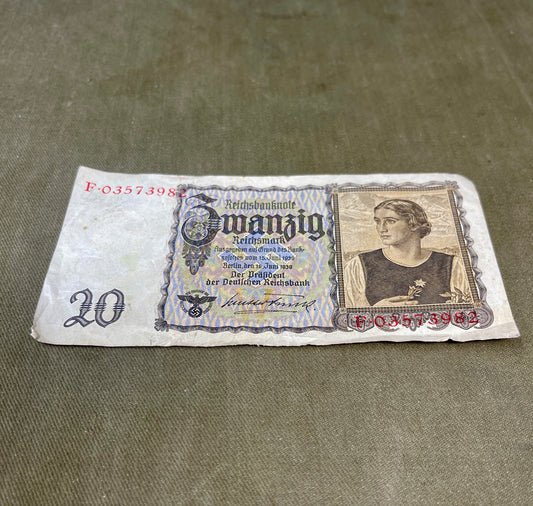 Vintage German banknote with portrait on a textured surface