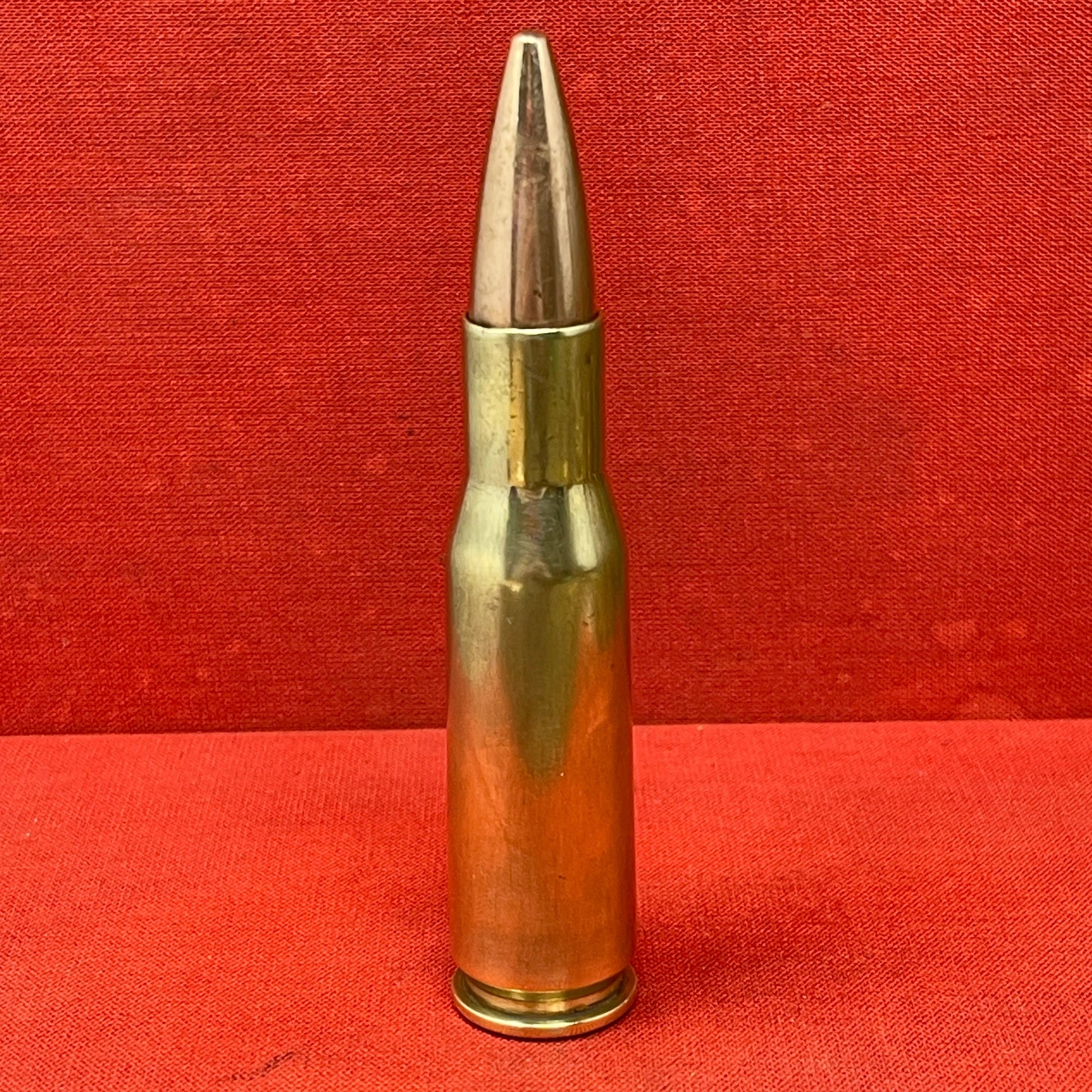 An Inert British .50 Cal Spotter round for 120mm Wombat