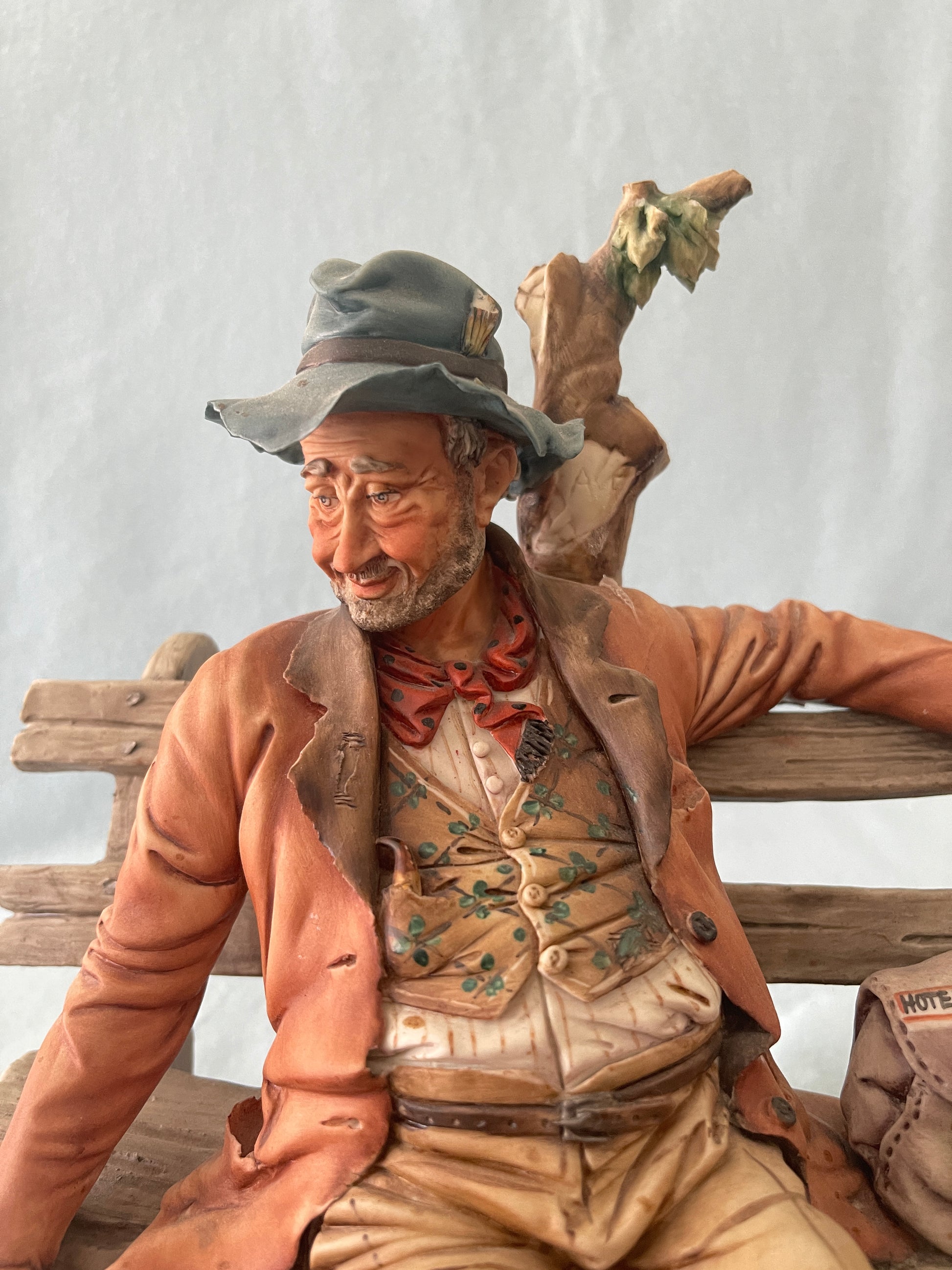 Capodimonte Tramp on Bench Figurine by Volta