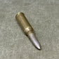 Bulleted cartridge on a concrete surface