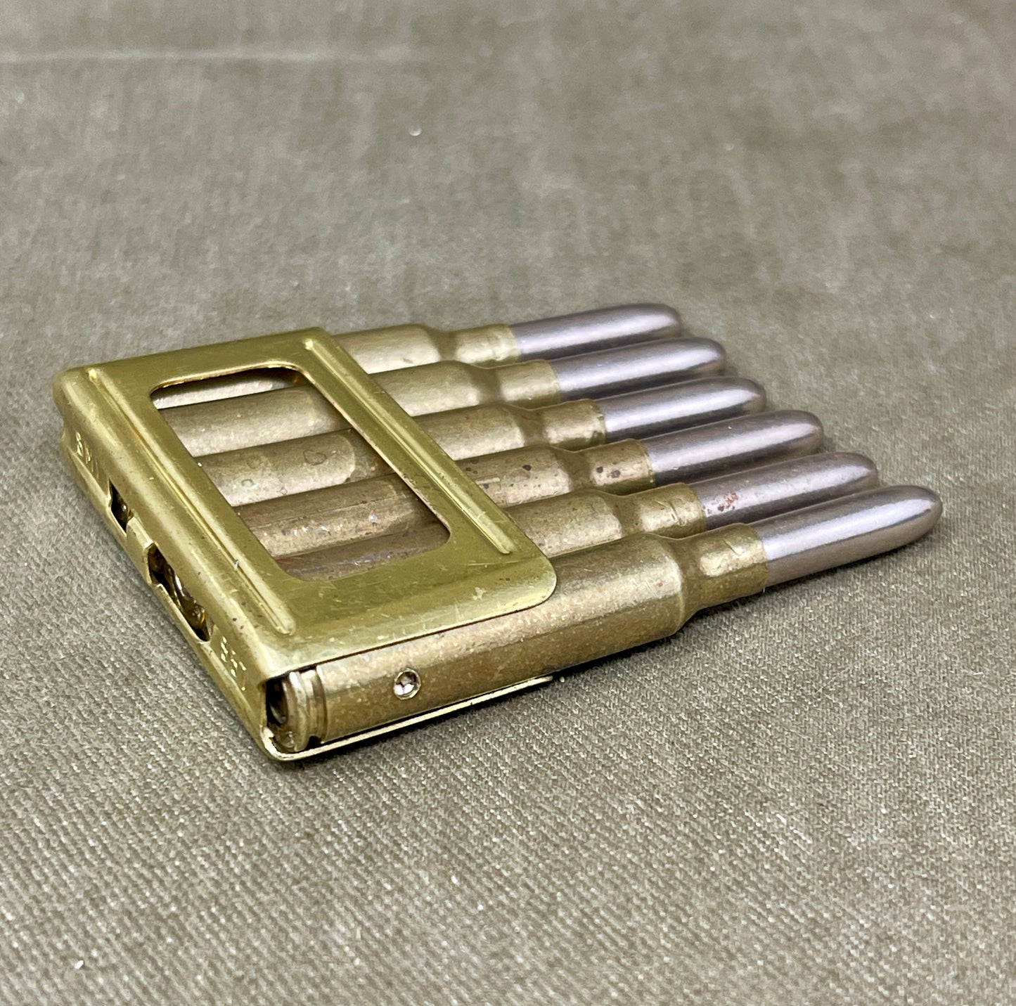 Metallic tool with multiple components on a textured surface