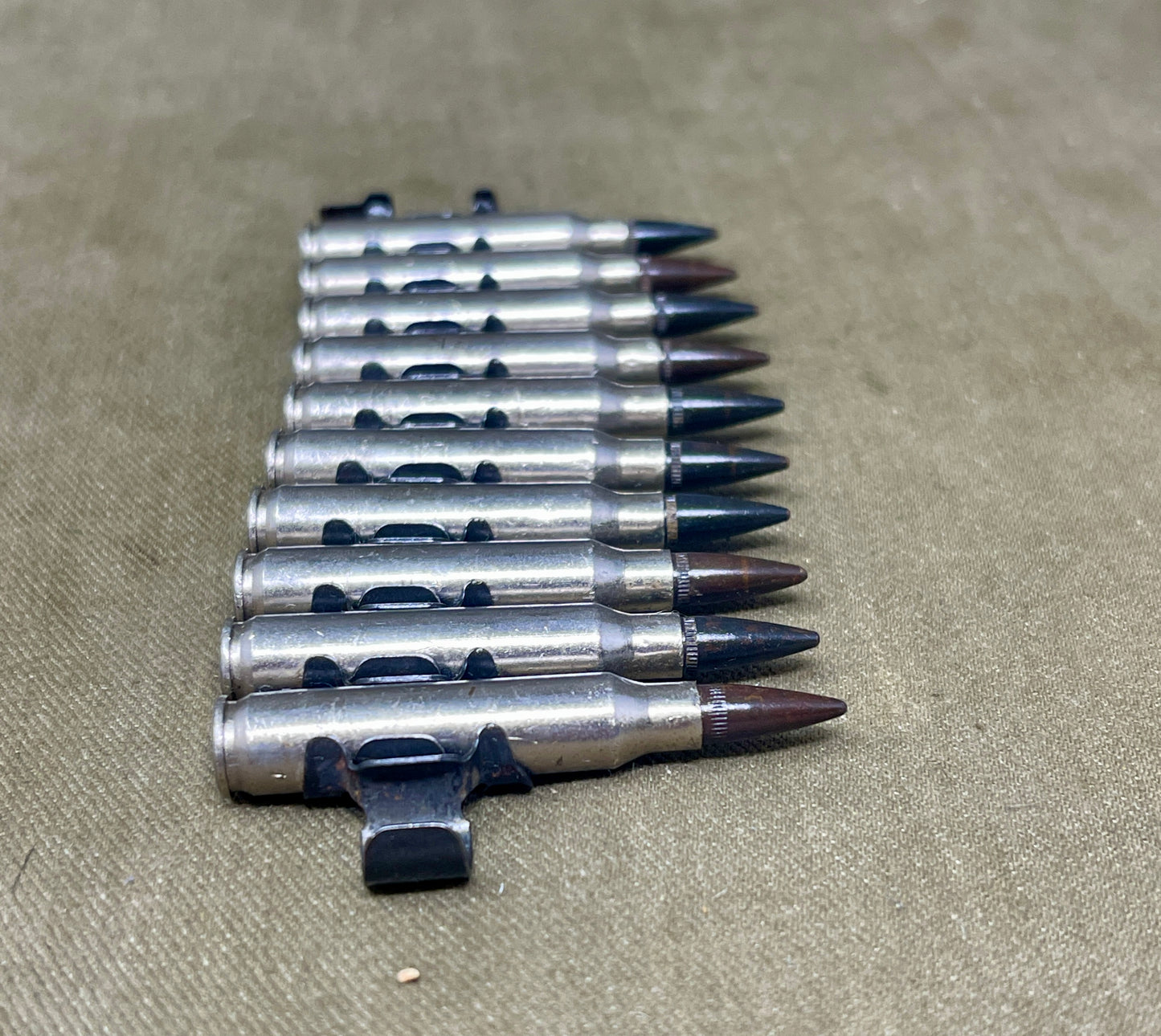 M249 LMG 5.56mm Nickel‑Plated INERT Belt of 10 | Display Ammunition