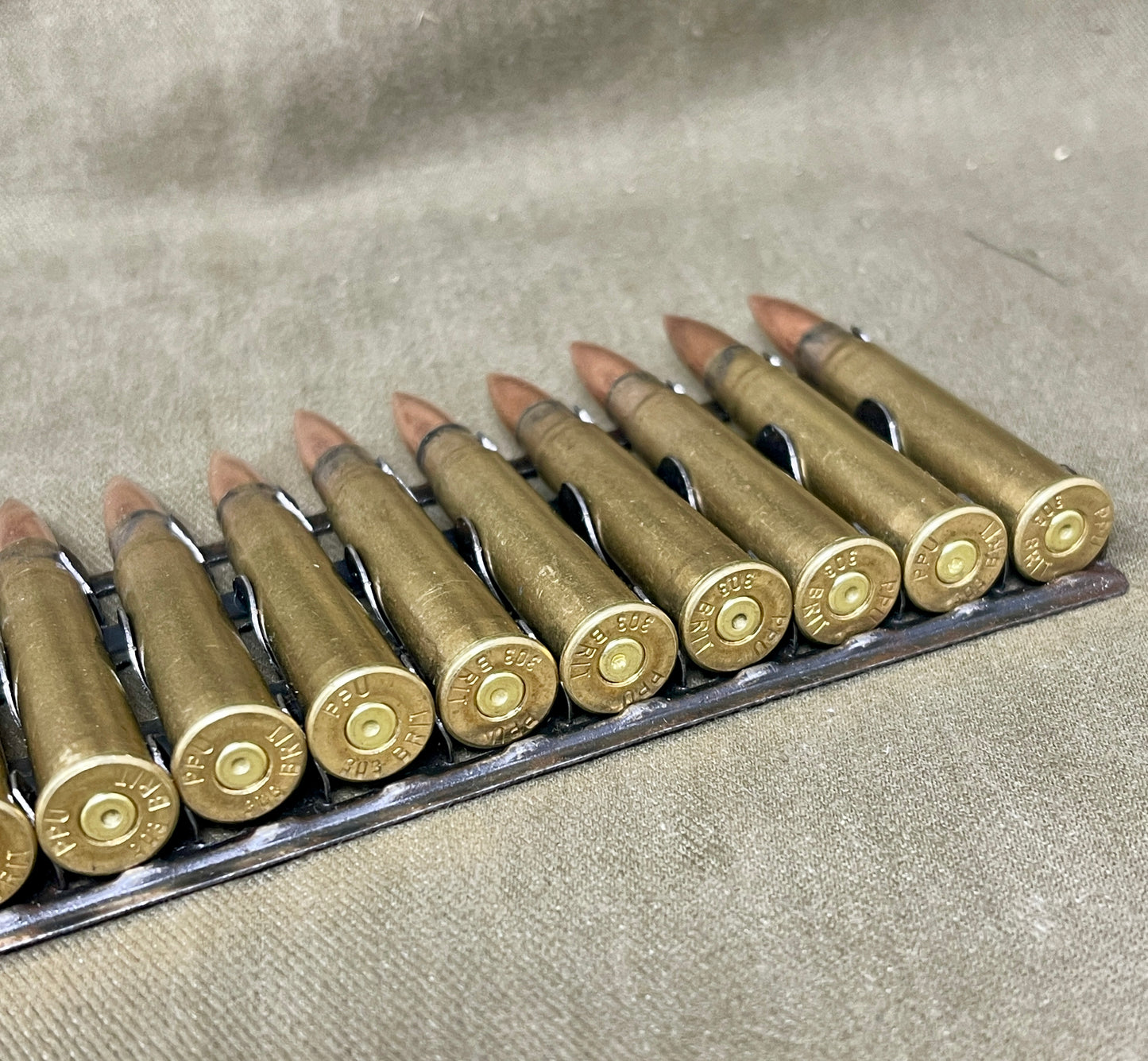 30 × Inert .303 British Rounds Fitted to 30‑Round Hotchkiss Magazine Strip