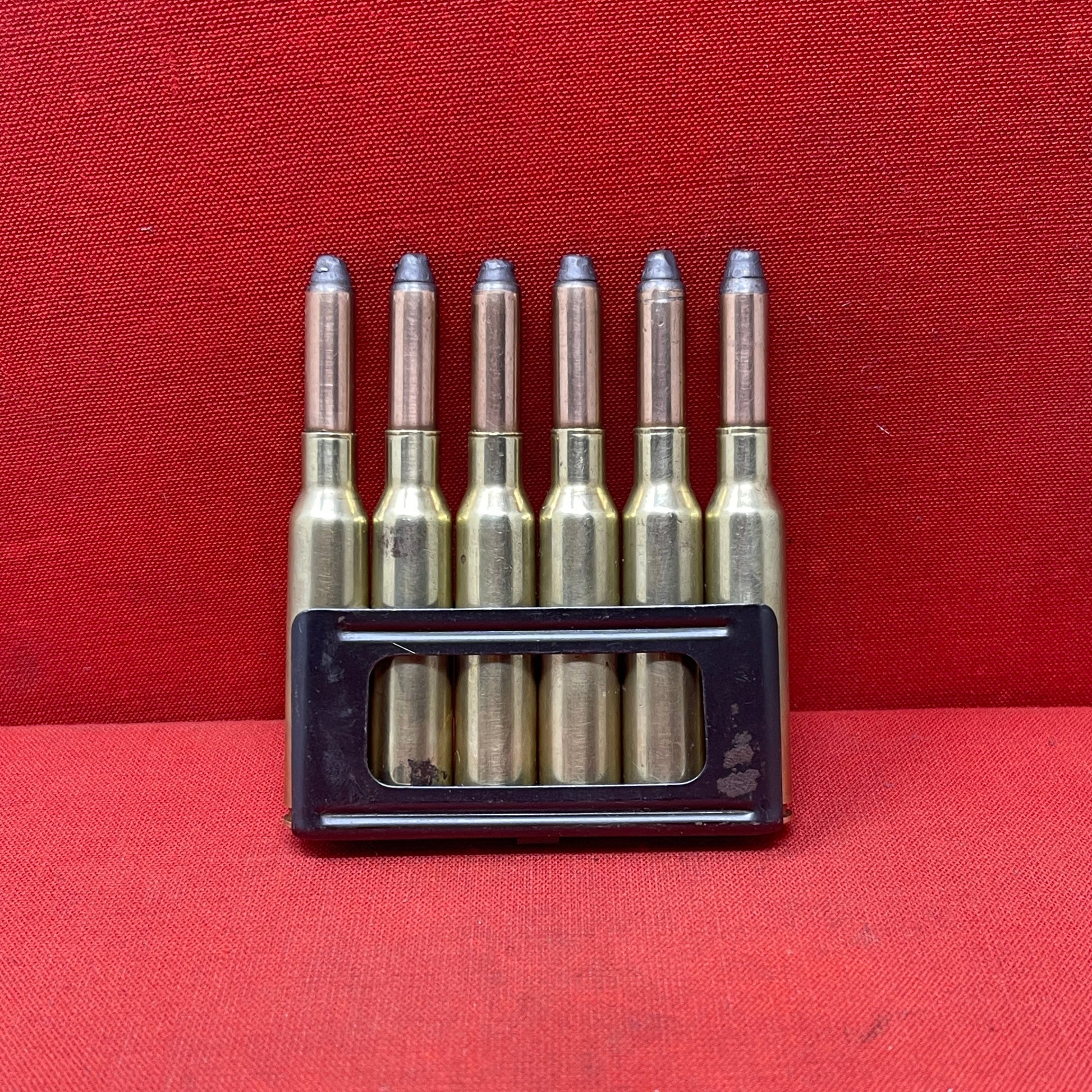 6 x 6.5mm Carcano rounds in clip (inert) (4) (M2)