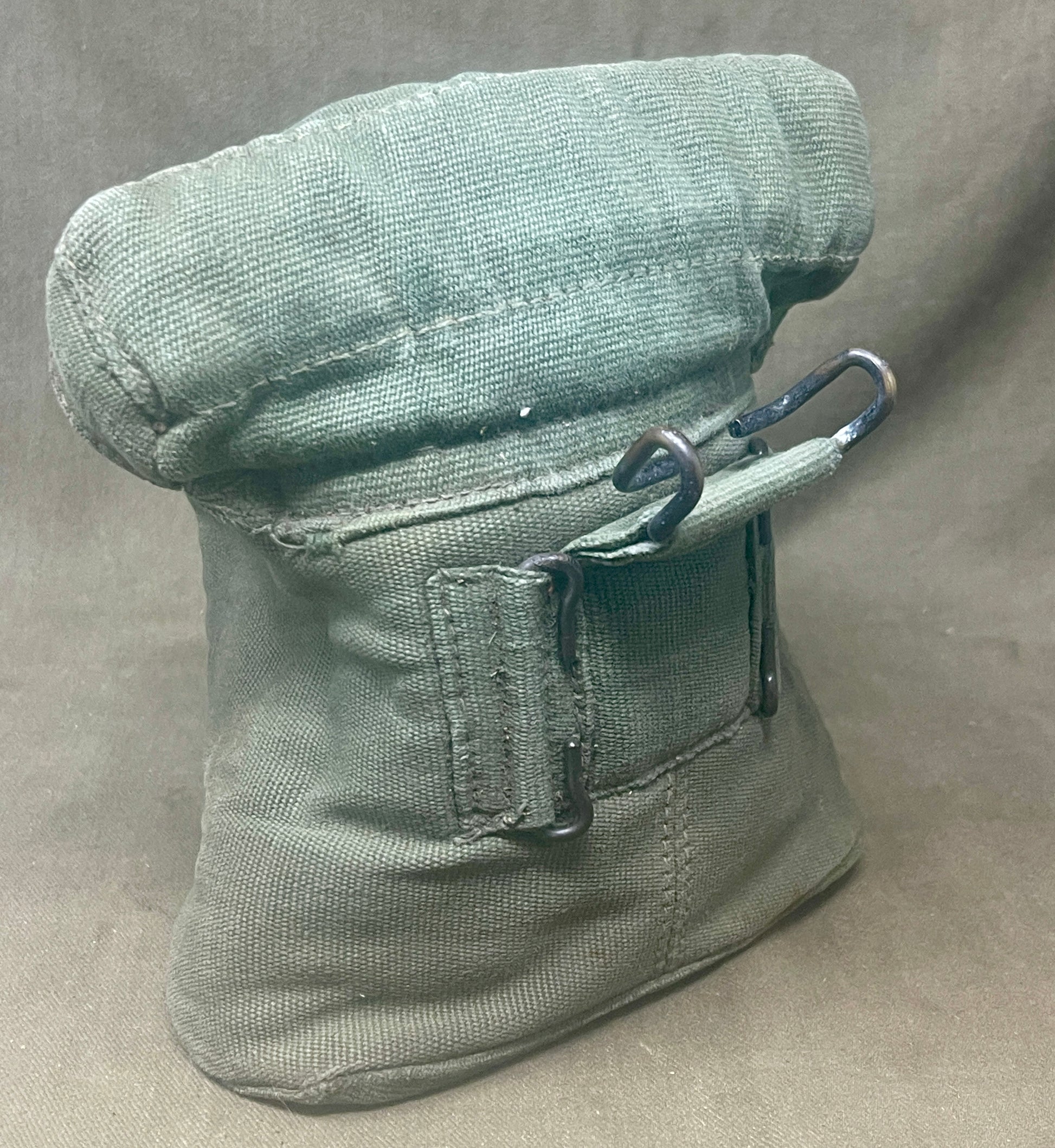 "Discover the 1944 Pattern Webbing Binocular Case, dated 1945, a durable and practical piece of WWII military equipment. Ideal for collectors and enthusiasts of military history."