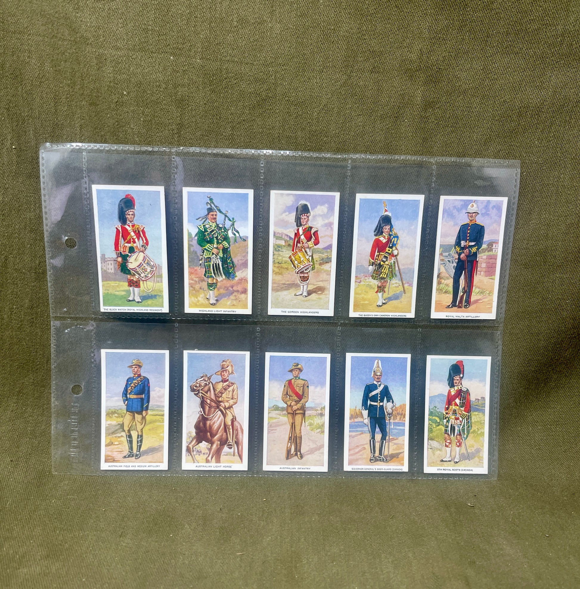 "Explore the Godfrey Phillips Ltd 'Soldiers of the King' cigarette cards, showcasing stunning illustrations and historical insights into British Army regiments. A valuable collectible for military history enthusiasts."