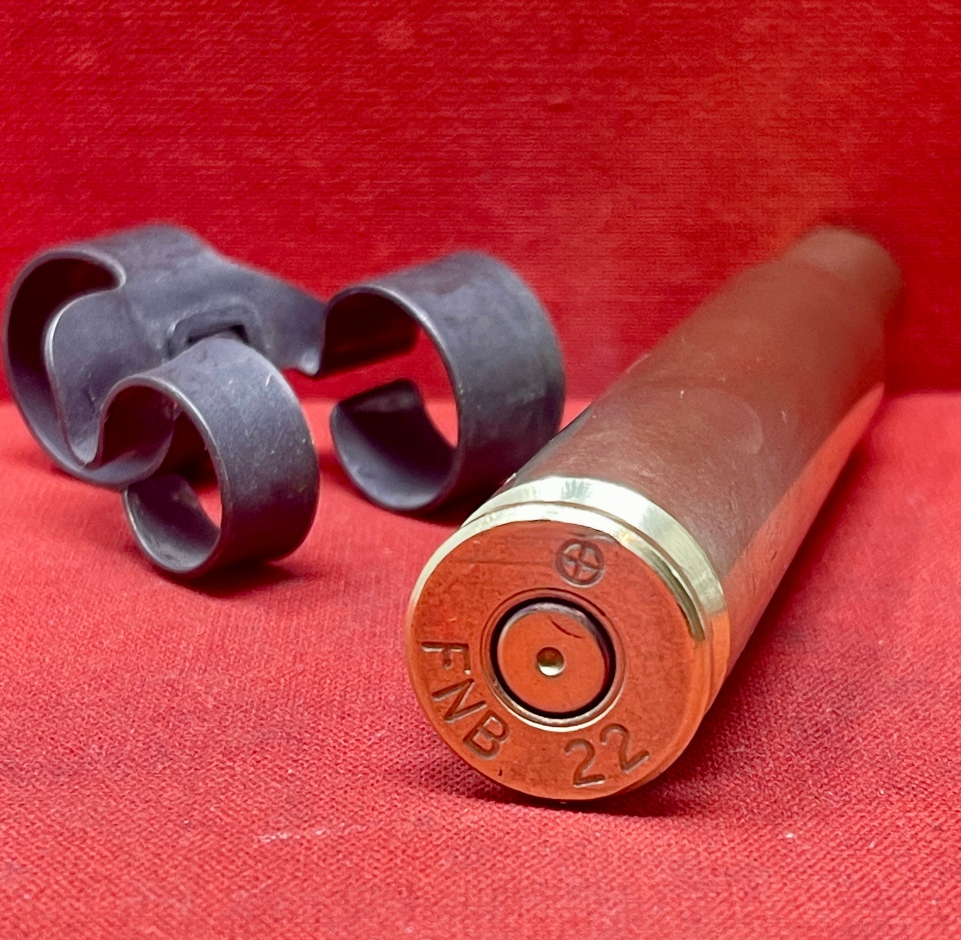 The 50 Cal cartridge cases stamped "FNB 22" refer to .50 caliber BMG (Browning Machine Gun) cartridge cases manufactured in 2022 by Fabrique Nationale de Herstal (FN Herstal), a prominent arms manufacturer in Belgium. The .50 BMG is a powerful, high-velocity round originally developed in the early 20th century for the Browning M2 heavy machine gun but is now widely used in various military, law enforcement, and civilian applications, particularly for long-range precision shooting, anti-material rifles, and 