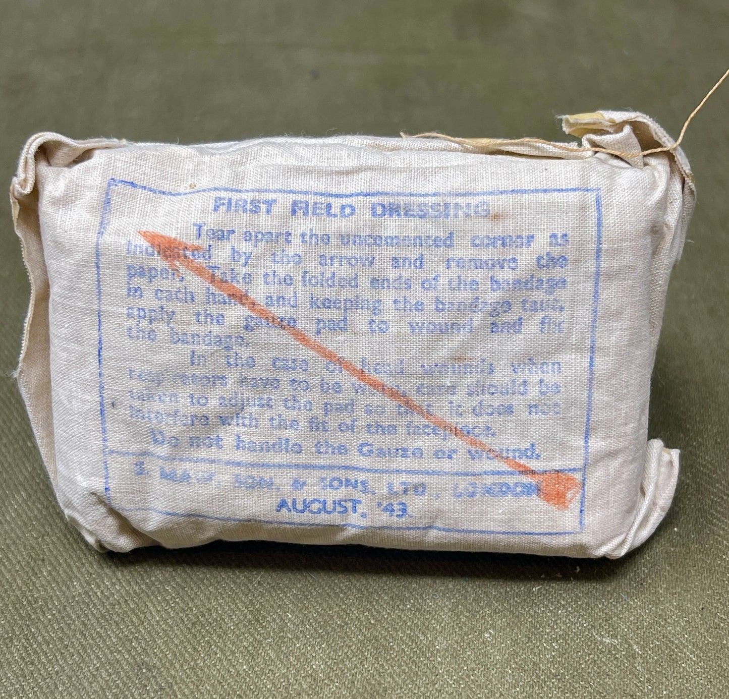 This Large First Aid Dressing, manufactured by T.J. Smith & Nephew Ltd in Hull, England, is a vintage medical supply that highlights the craftsmanship and practical design of mid-20th-century healthcare essentials. Known for its reliability and quality, Smith & Nephew was a renowned manufacturer of medical and surgical products, and this dressing reflects their commitment to excellence.

The dressing is designed for emergency use, providing a sterile and absorbent solution for treating wounds, cuts, or inju