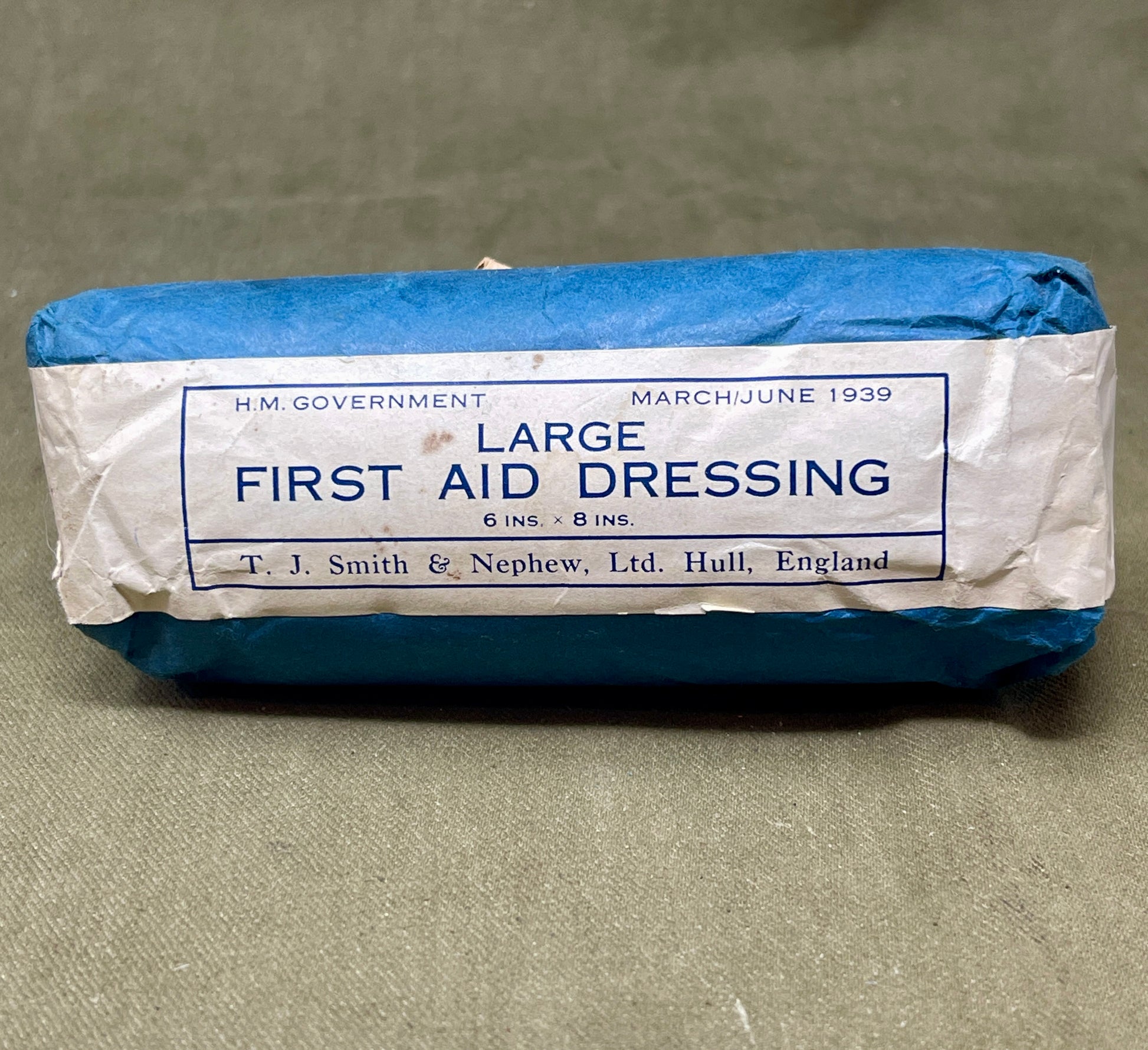 This Large First Aid Dressing, manufactured by T.J. Smith & Nephew Ltd in Hull, England, is a vintage medical supply that highlights the craftsmanship and practical design of mid-20th-century healthcare essentials. Known for its reliability and quality, Smith & Nephew was a renowned manufacturer of medical and surgical products, and this dressing reflects their commitment to excellence.

The dressing is designed for emergency use, providing a sterile and absorbent solution for treating wounds, cuts, or inju