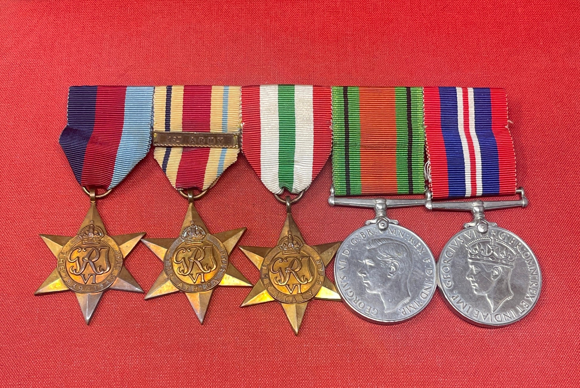 A WWII Medal Group Defence Medal, War Medal, Italy, Africa and 1939-45 Star 