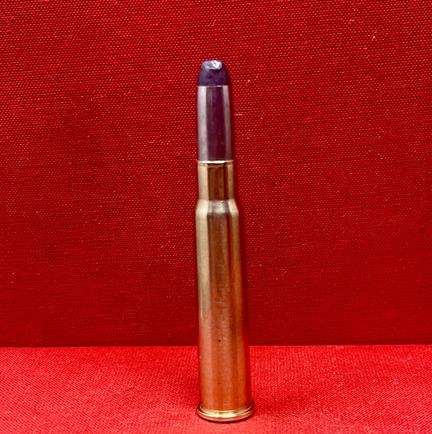 Explore an original RWS 8x57JR inert round, a rare collectible piece of European hunting ammunition history. Perfect for collectors and enthusiasts of vintage cartridges.