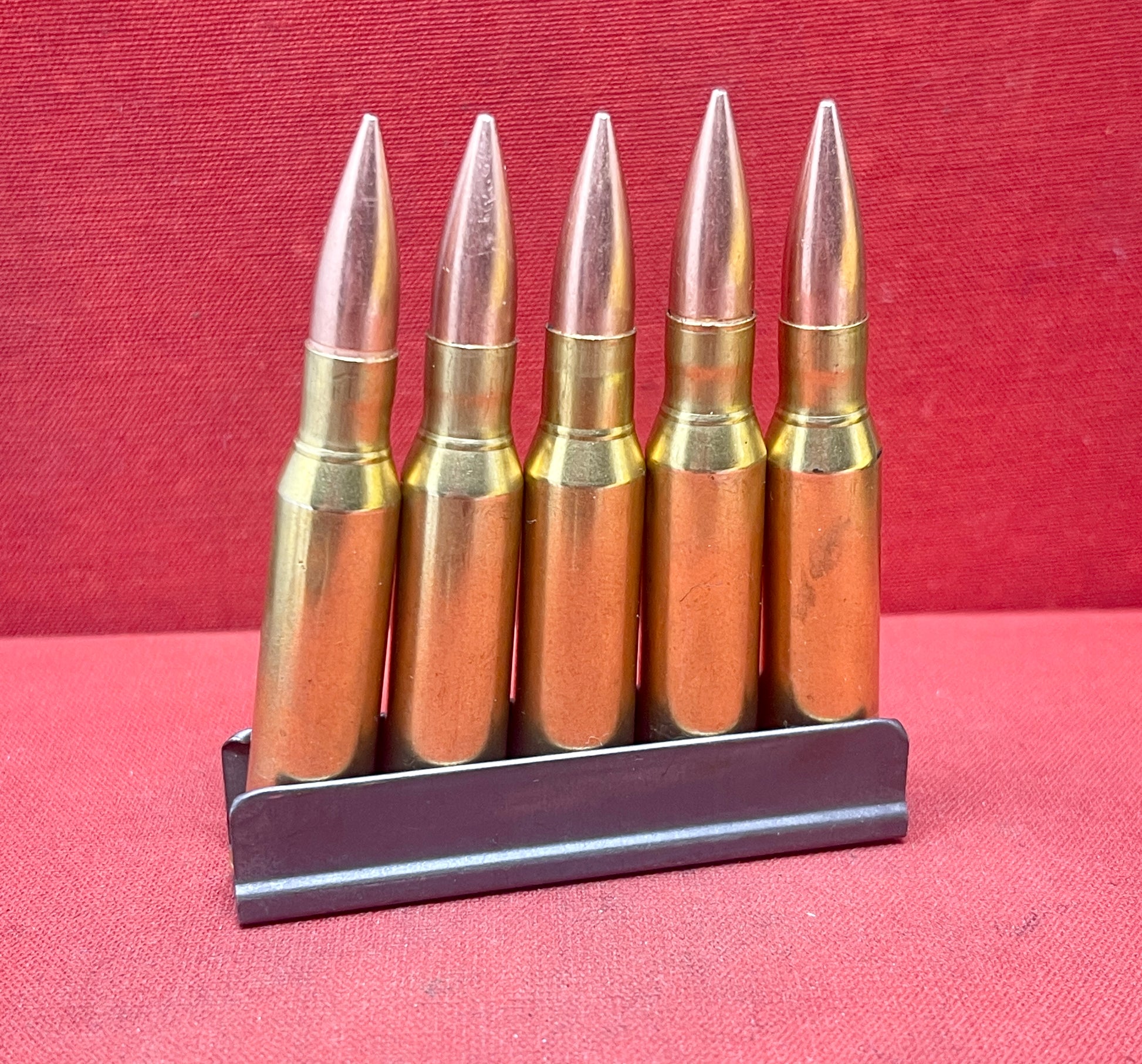 "5x Original 7.62x54mm Russian Inert Cartridges with Stripper Clip – For Sale"






