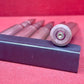 "Discover 5 authentic 7.62x54mm Russian inert cartridges on a classic stripper clip. Perfect for collectors and enthusiasts, these safe, deactivated rounds showcase military history."