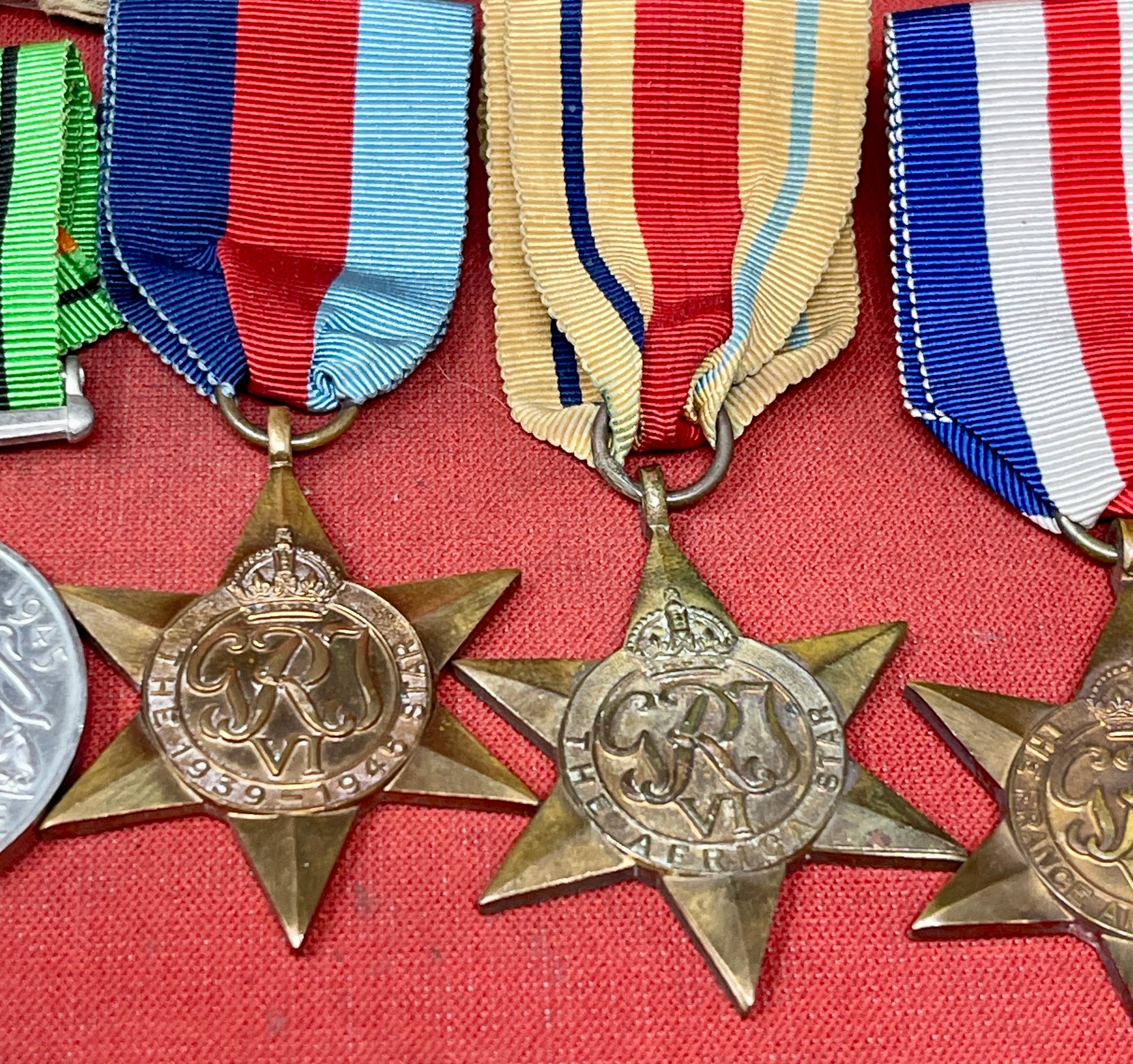 A WWII Medal Group Defence Medal, War Medal,  Africa , France Germany & 1939-45 Stars.