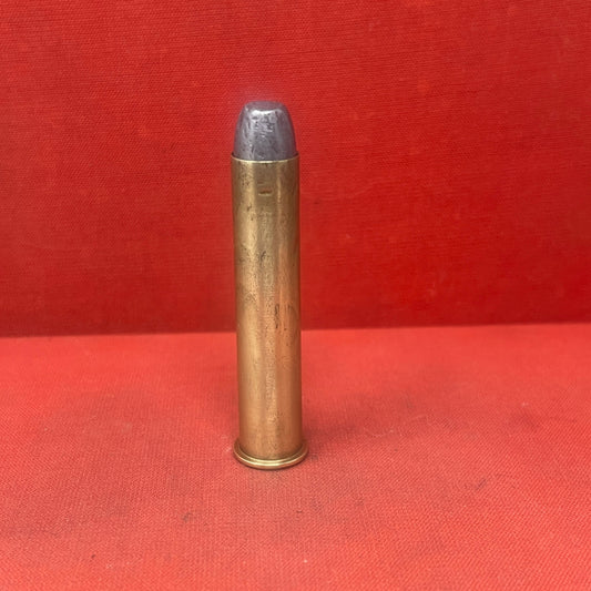 
"Original WRACO .45-90 WCF inert cartridge from the late 19th century.